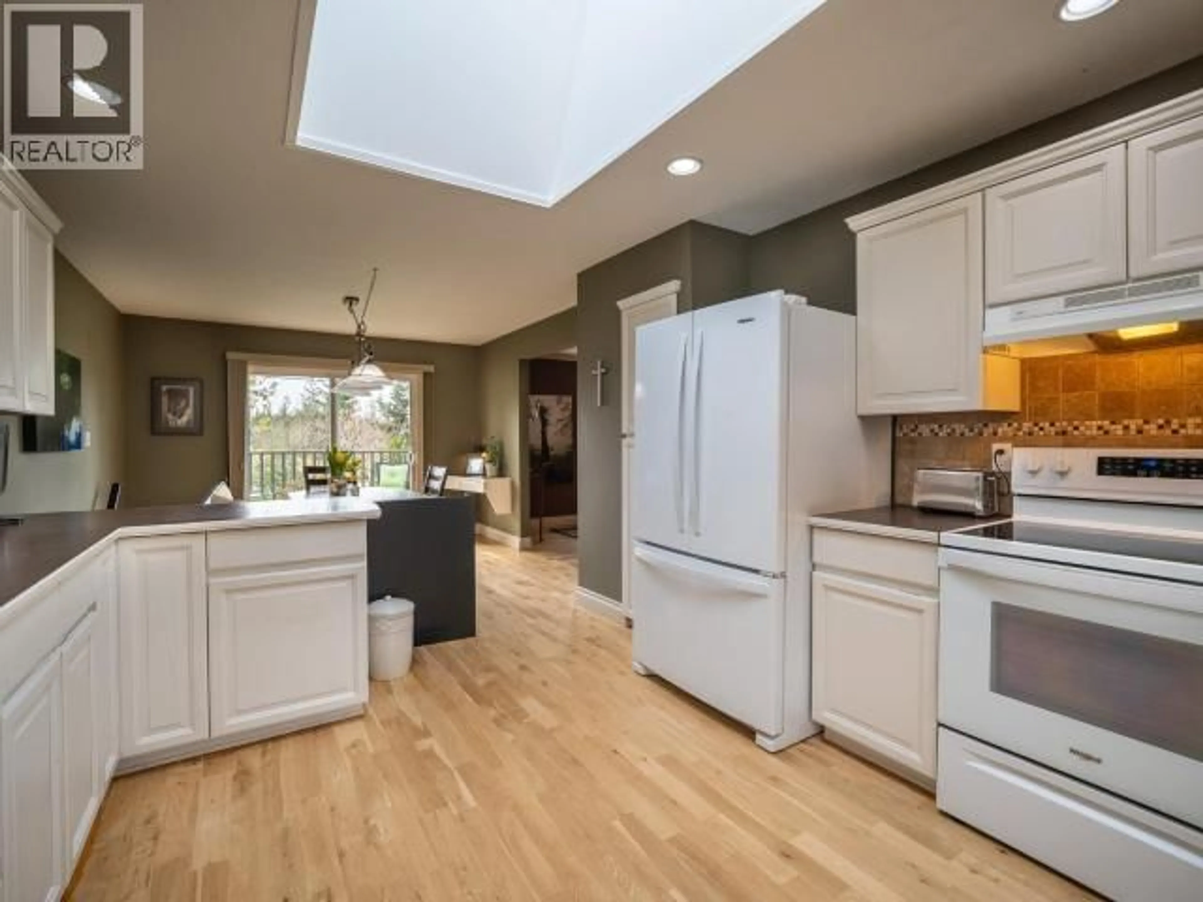 Open concept kitchen, unknown for 7423 NOOTKA STREET, Powell River British Columbia V8A0P8