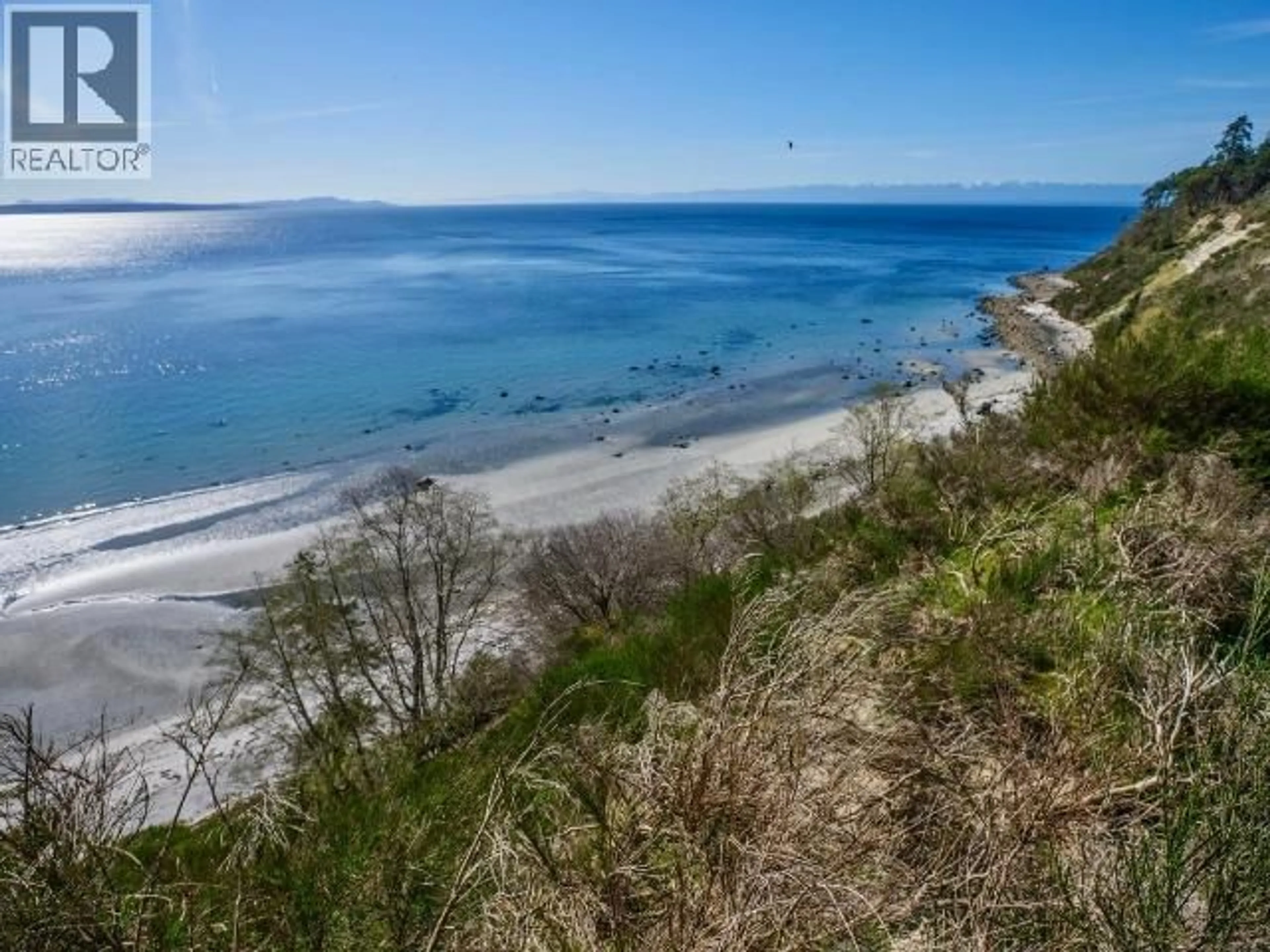 A pic from outside/outdoor area/front of a property/back of a property/a pic from drone, water/lake/river/ocean view for 3020 ASHWORTH WALK, Savary Island British Columbia