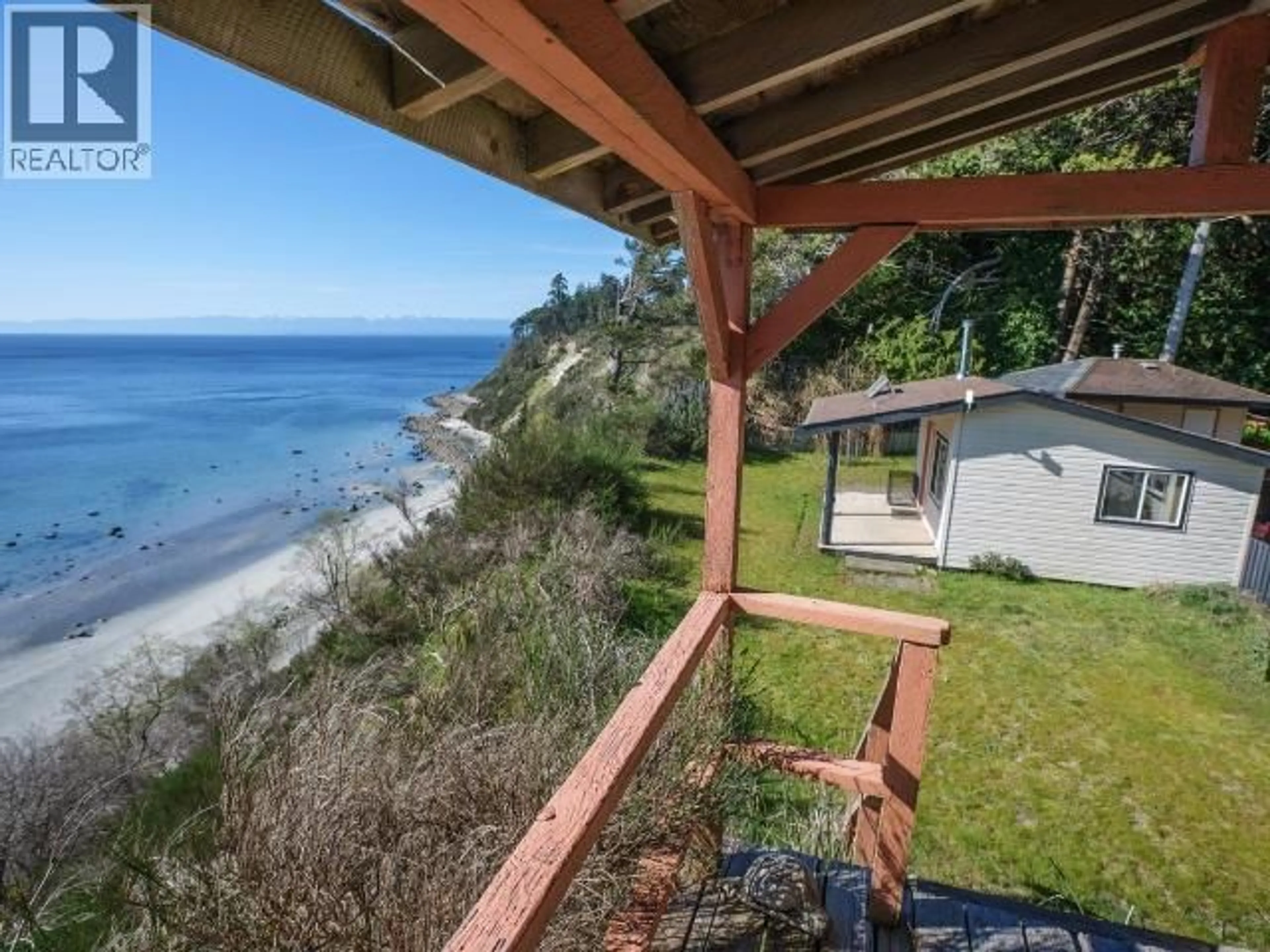 A pic from outside/outdoor area/front of a property/back of a property/a pic from drone, water/lake/river/ocean view for 3020 ASHWORTH WALK, Savary Island British Columbia