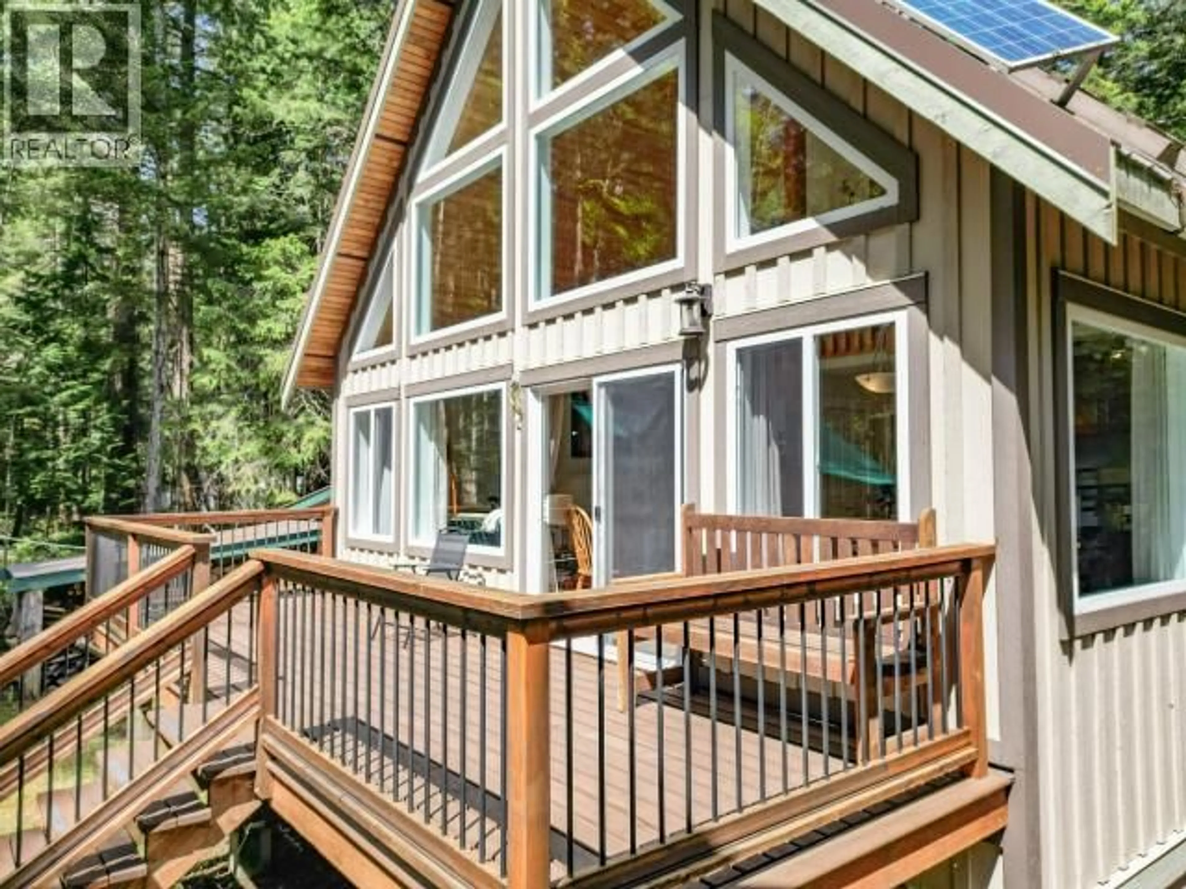 Home with vinyl exterior material, forest/trees view for 1259 VANCOUVER BLVD, Savary Island British Columbia