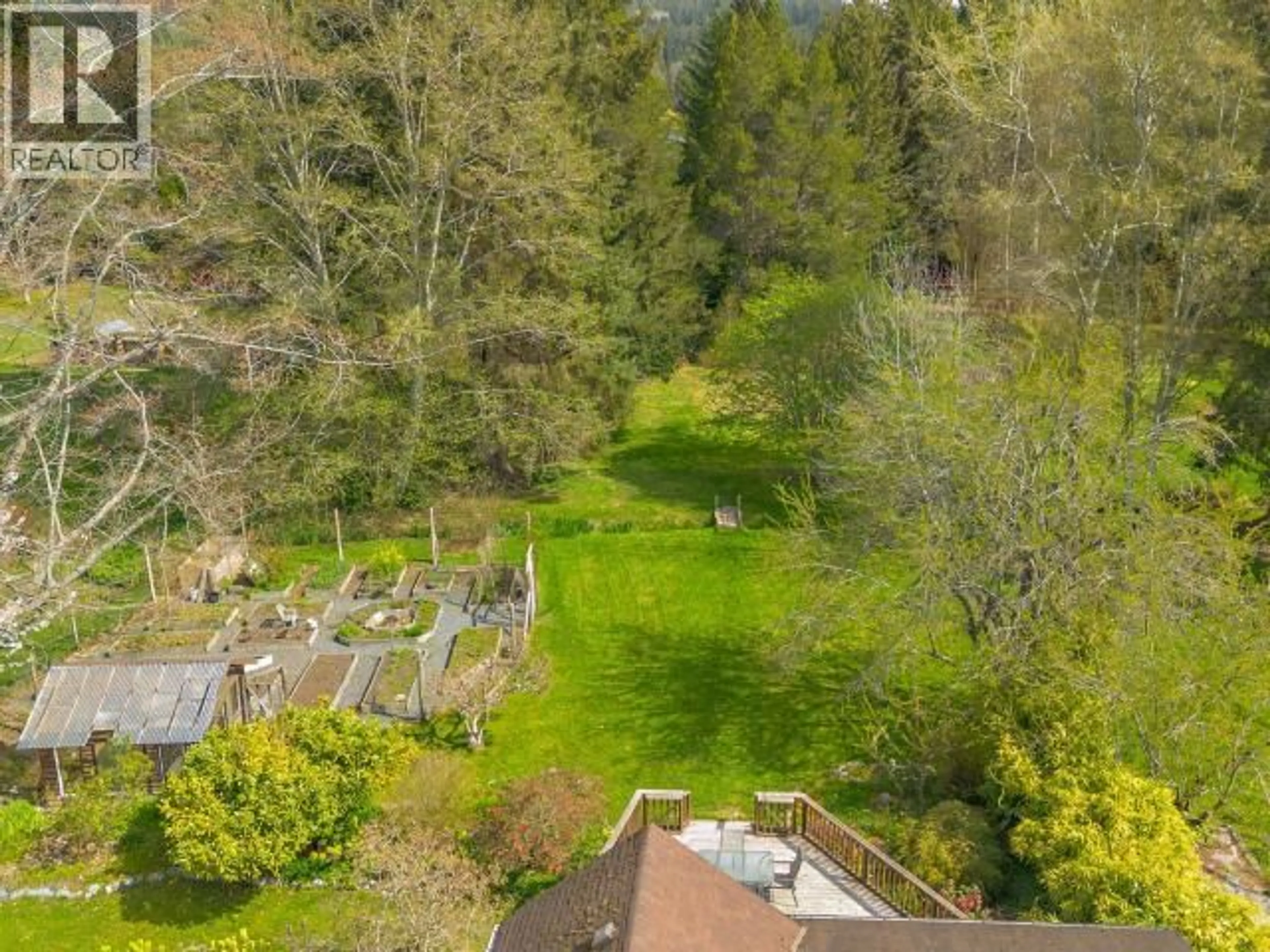 A pic from outside/outdoor area/front of a property/back of a property/a pic from drone, forest/trees view for 5394 MANSON AVE, Powell River British Columbia V8A3P4