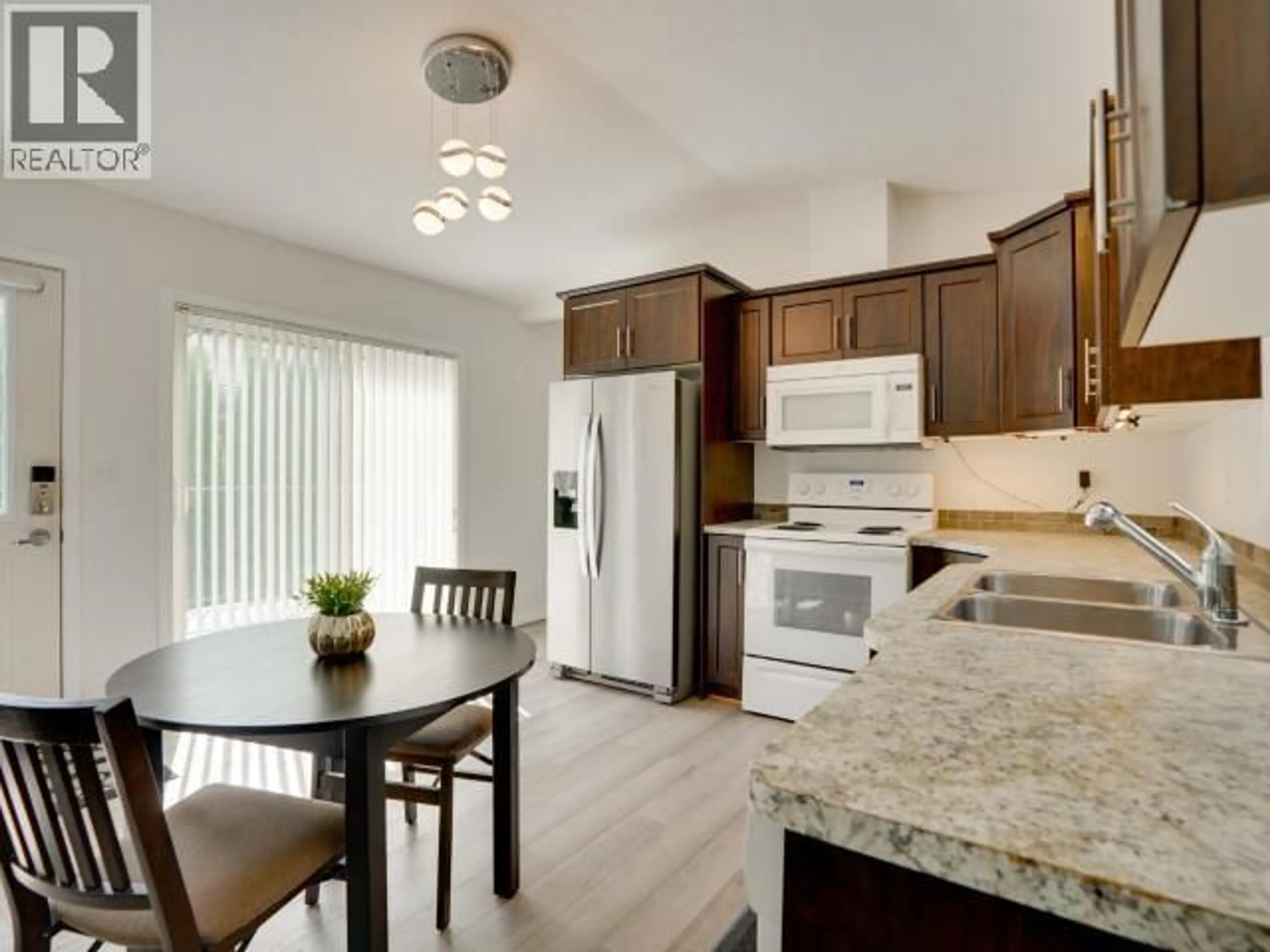 Open concept kitchen, unknown for 104 - 8430 SPRINGBROOK ROAD, Powell River British Columbia V8A0S3