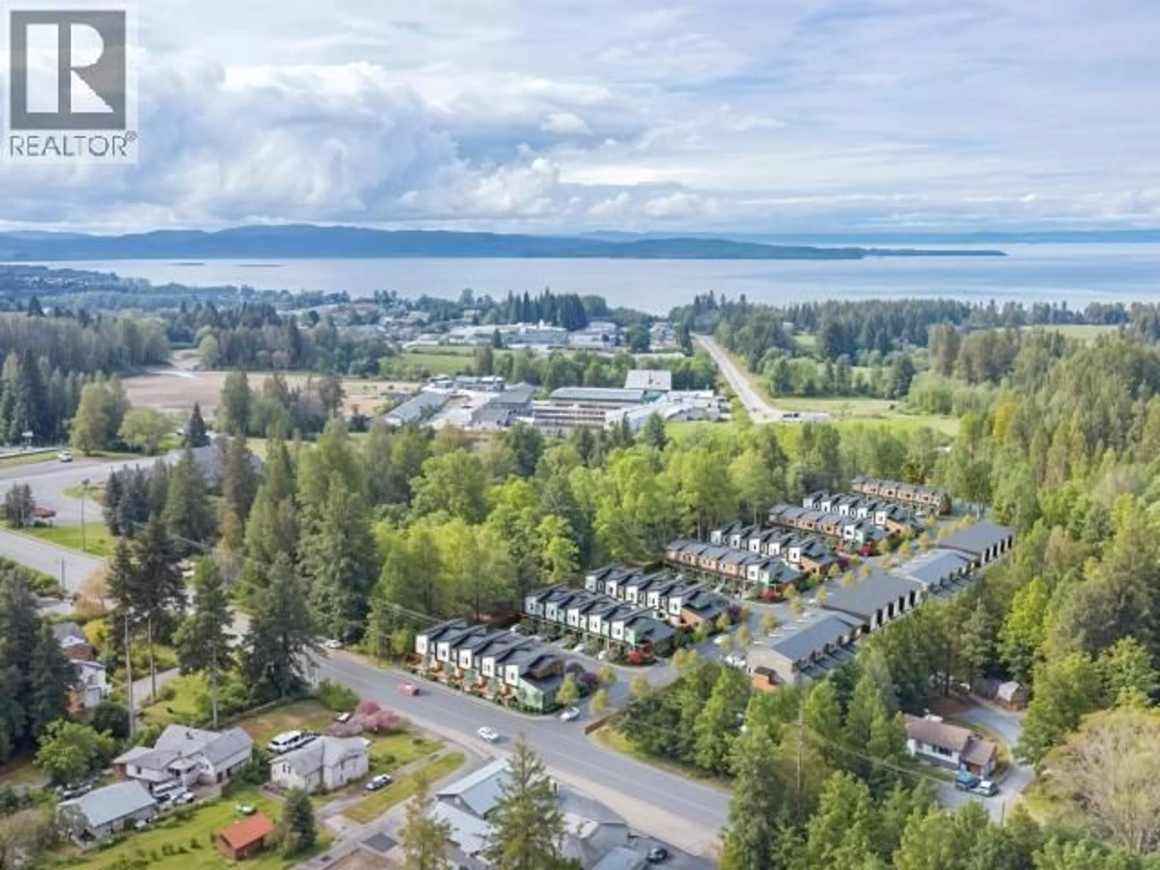 A pic from outside/outdoor area/front of a property/back of a property/a pic from drone, water/lake/river/ocean view for 5191 - 202 MANSON AVE, Powell River British Columbia V8A3P2