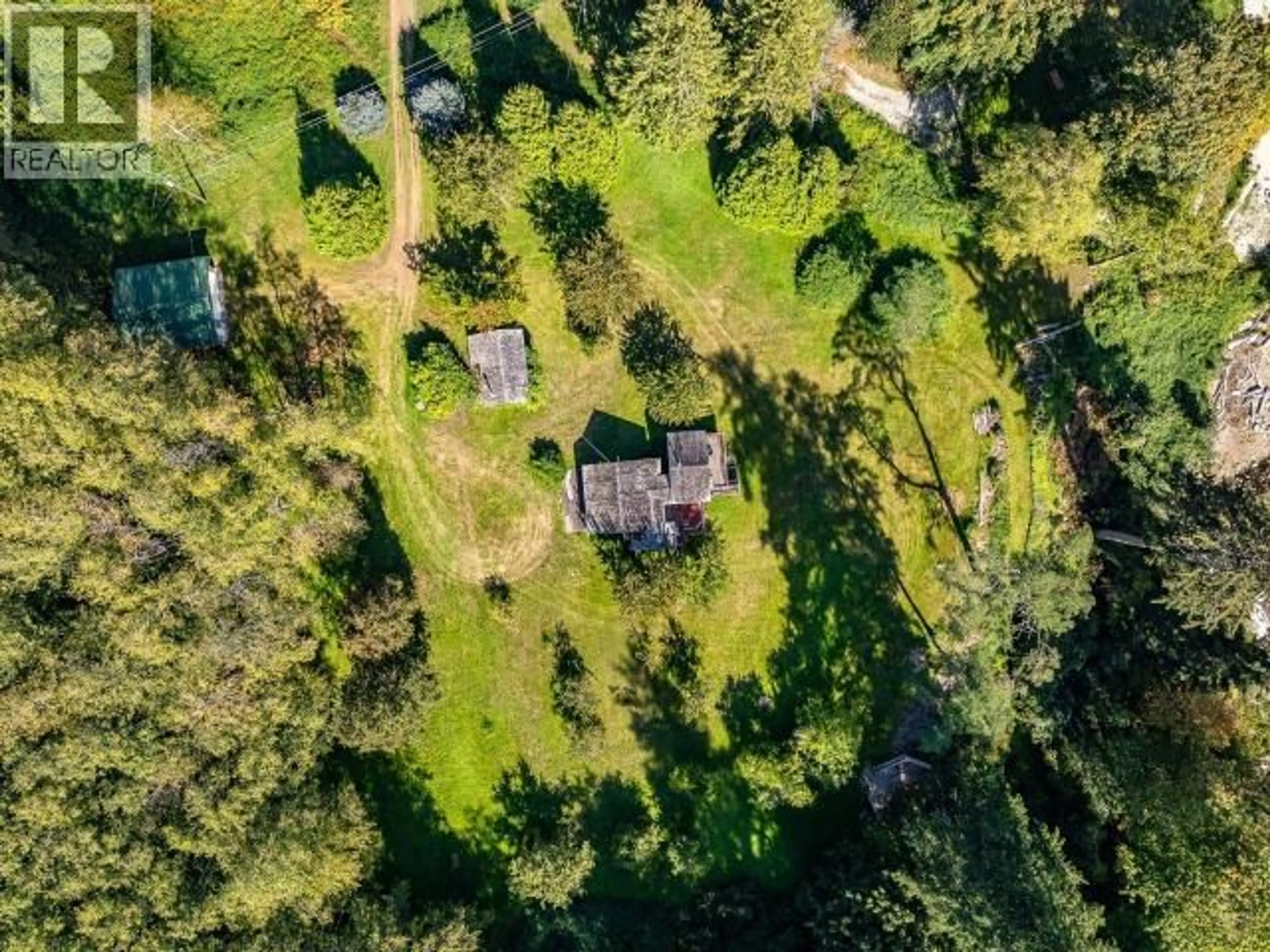 A pic from outside/outdoor area/front of a property/back of a property/a pic from drone, forest/trees view for 12683 HIGHWAY 101, Powell River British Columbia V8A0M9