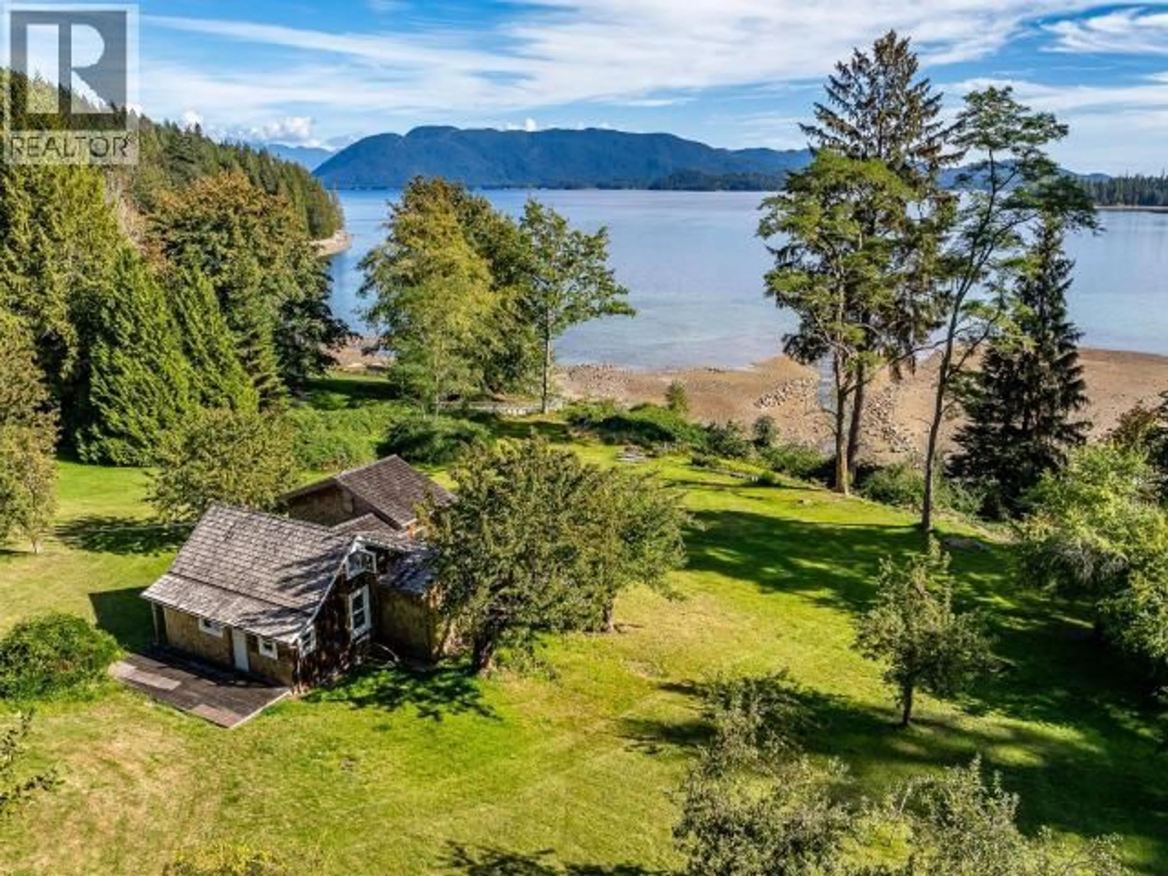 A pic from outside/outdoor area/front of a property/back of a property/a pic from drone, water/lake/river/ocean view for 12683 HIGHWAY 101, Powell River British Columbia V8A0M9