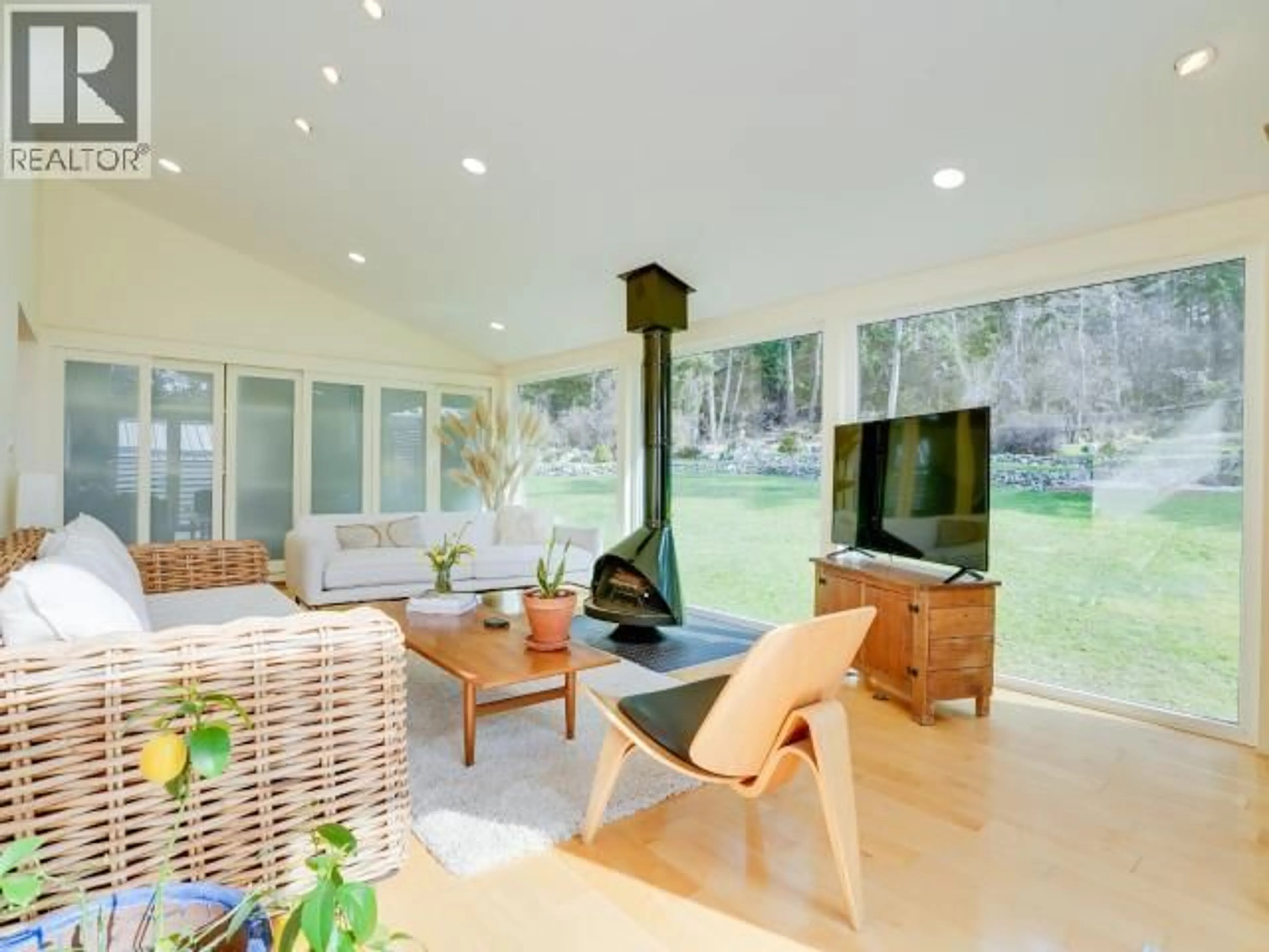 Living room with furniture, unknown for 5667 GILLIES BAY RD, Texada Island British Columbia V0N1W0