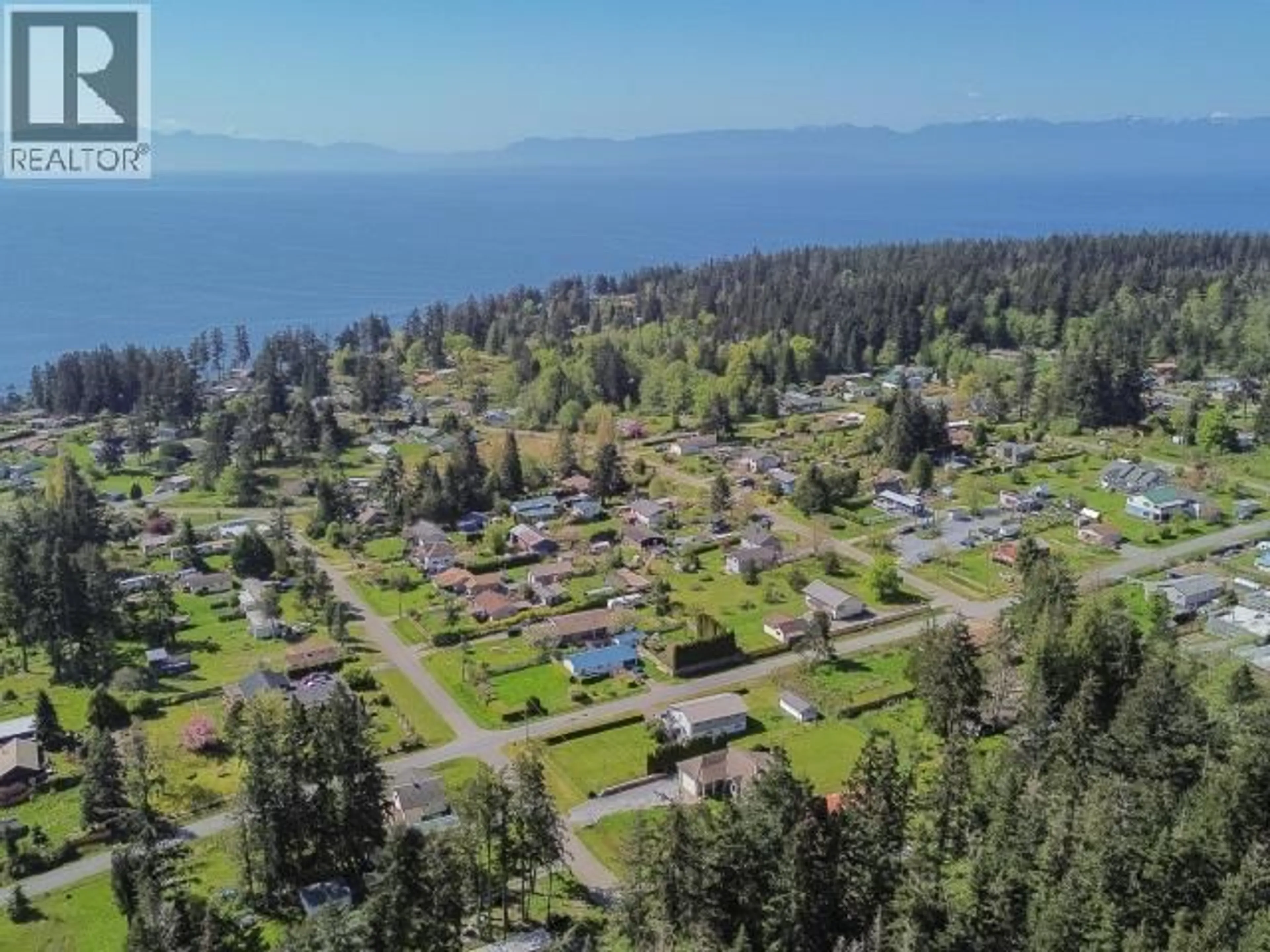 A pic from outside/outdoor area/front of a property/back of a property/a pic from drone, water/lake/river/ocean view for 3271 OAK STREET, Texada Island British Columbia