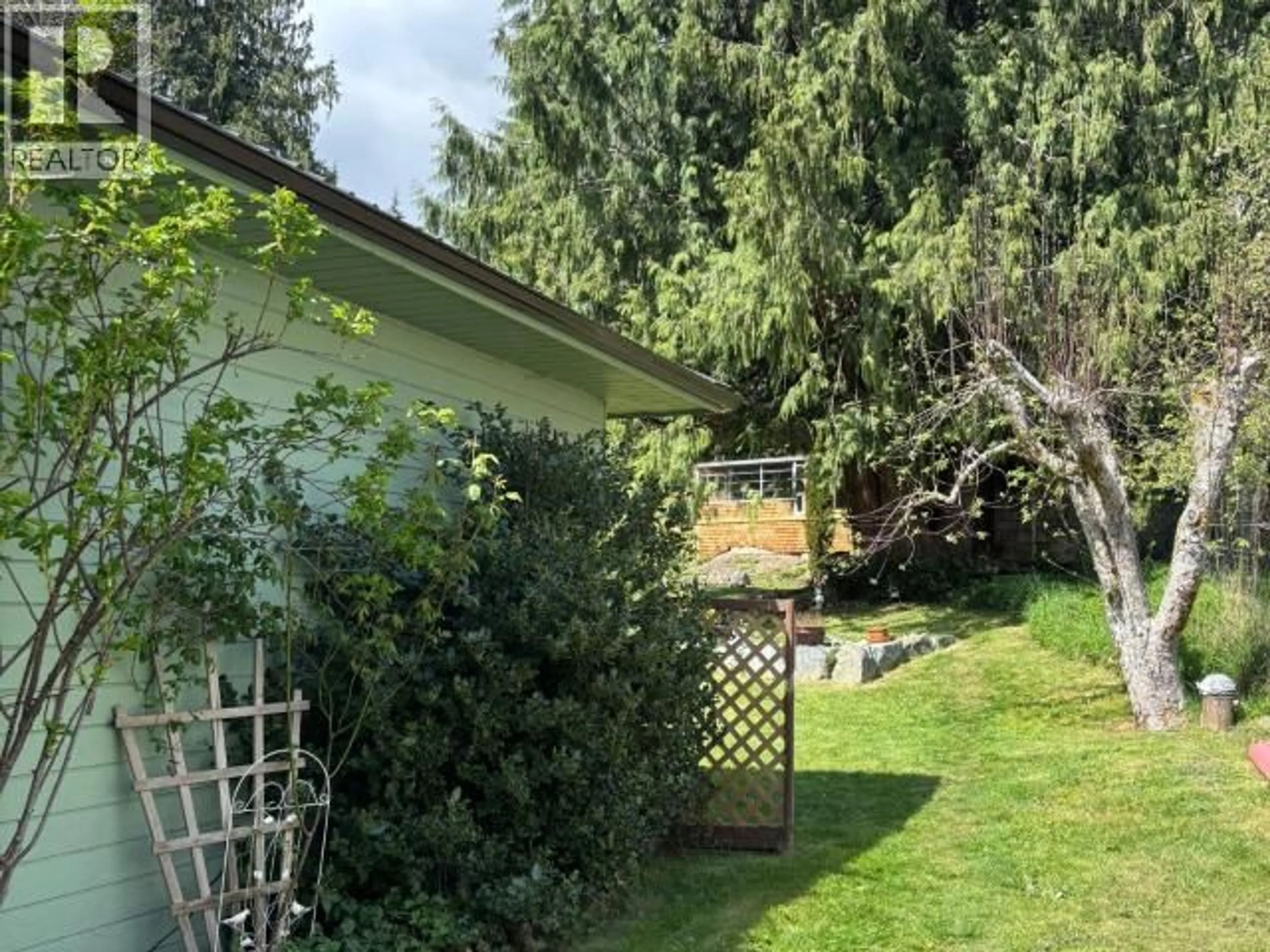 A pic from outside/outdoor area/front of a property/back of a property/a pic from drone, forest/trees view for 14987 SALTERY ROAD, Powell River British Columbia V8A0N3