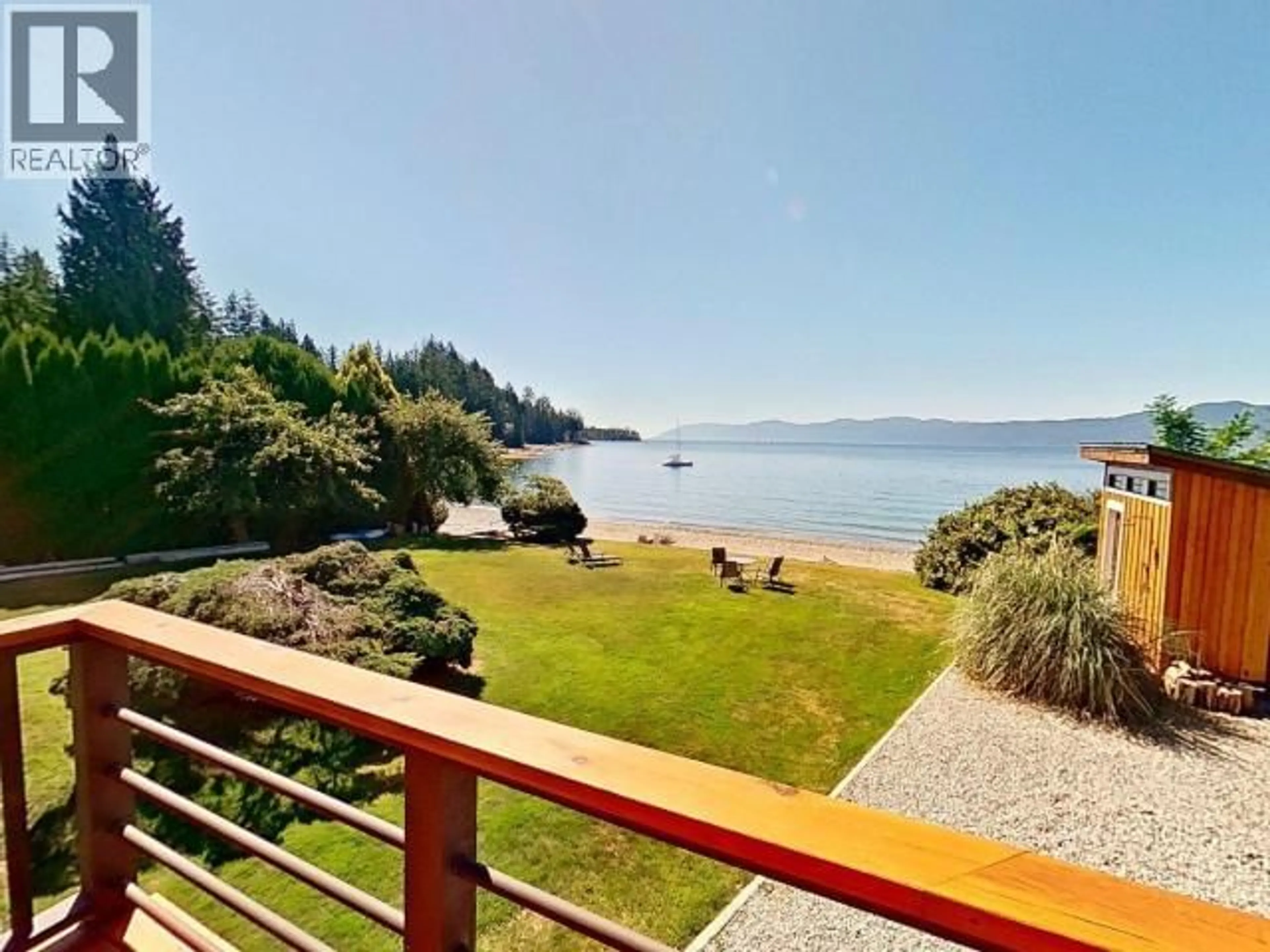 A pic from outside/outdoor area/front of a property/back of a property/a pic from drone, water/lake/river/ocean view for 12259 SCOTCH FIR POINT ROAD, Powell River British Columbia V8A0M5