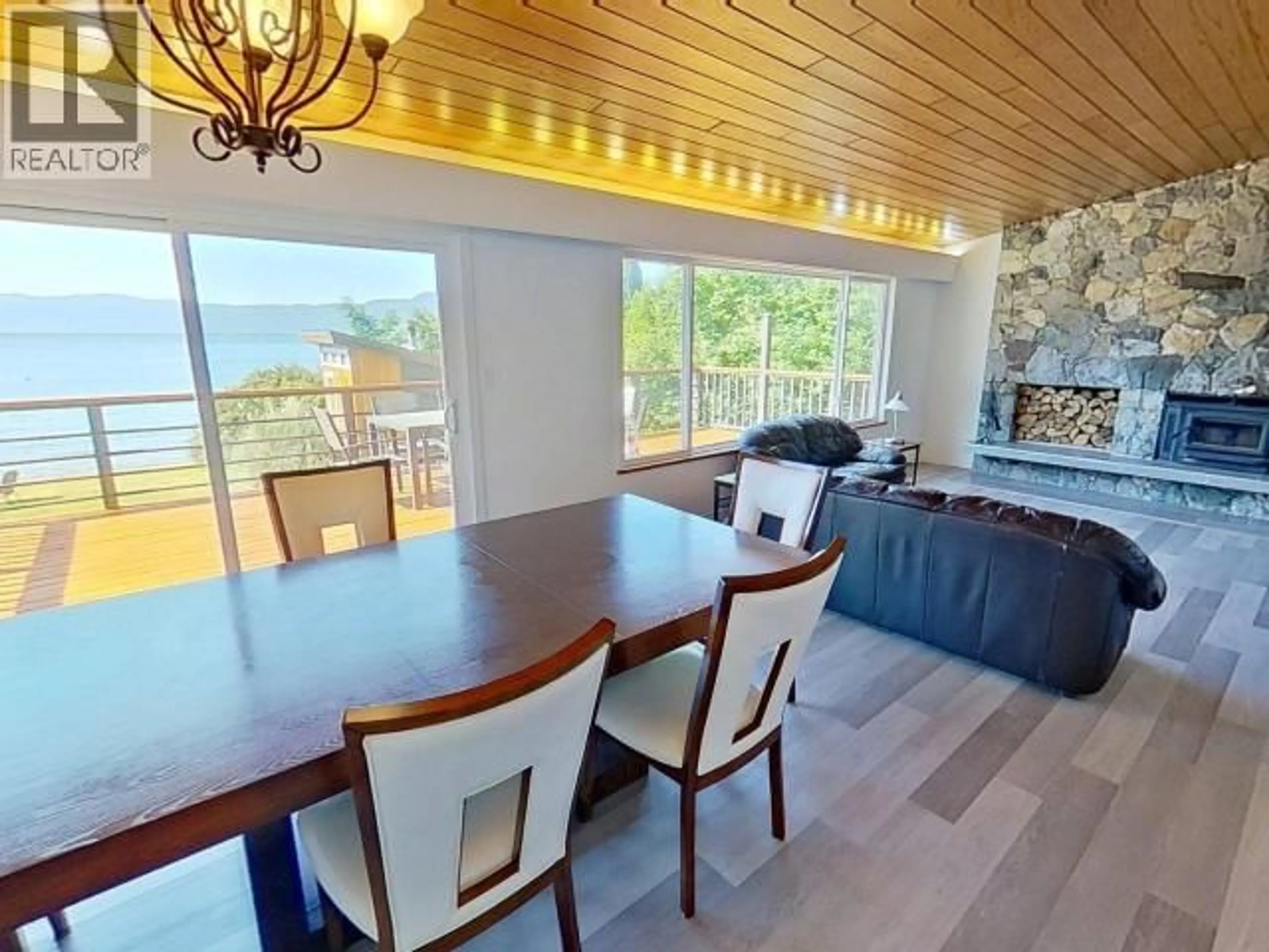 Dining room, wood/laminate floor for 12259 SCOTCH FIR POINT ROAD, Powell River British Columbia V8A0M5