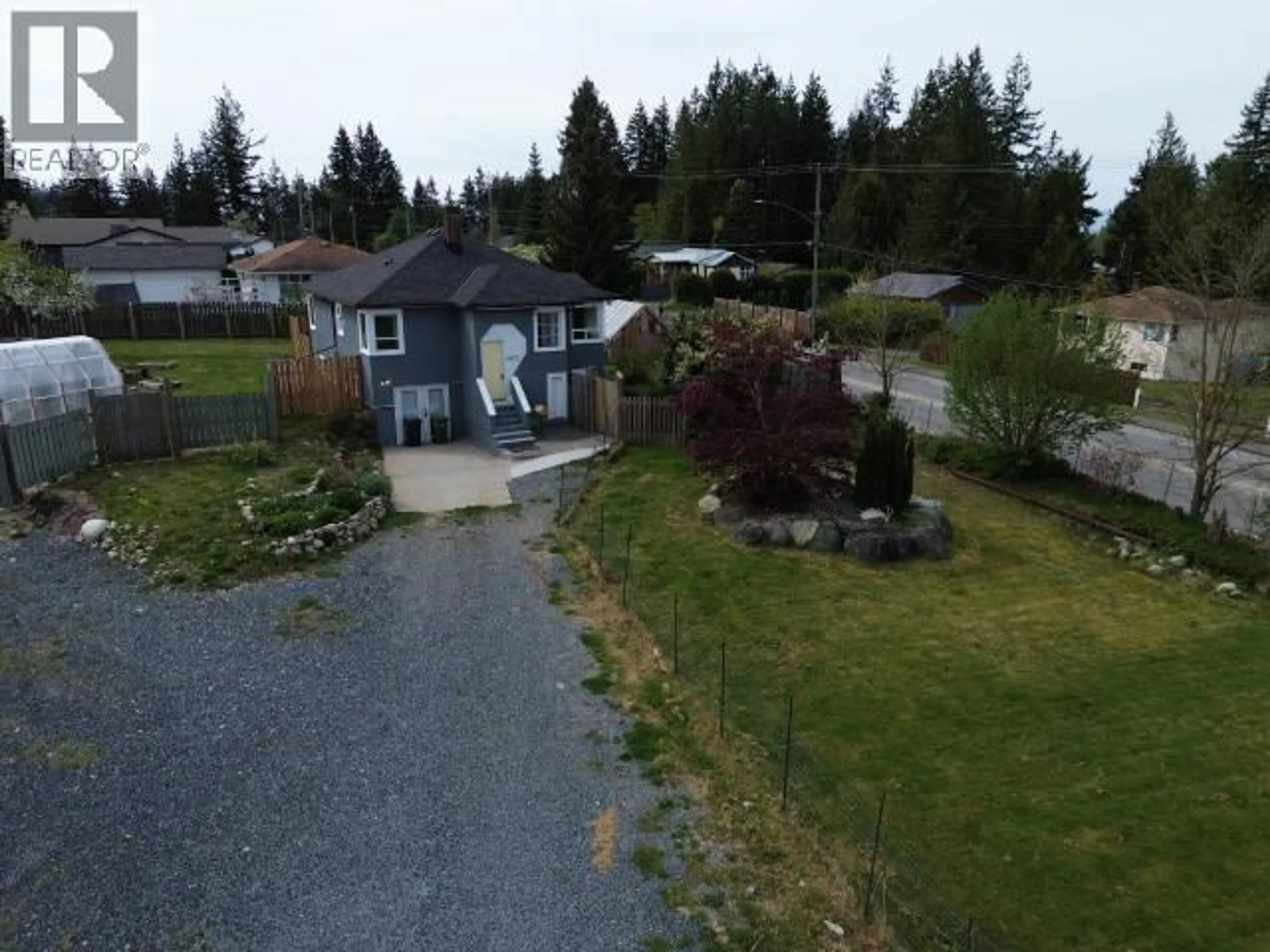 A pic from outside/outdoor area/front of a property/back of a property/a pic from drone, street for 4973 QUEENS AVE, Powell River British Columbia V8A3S8