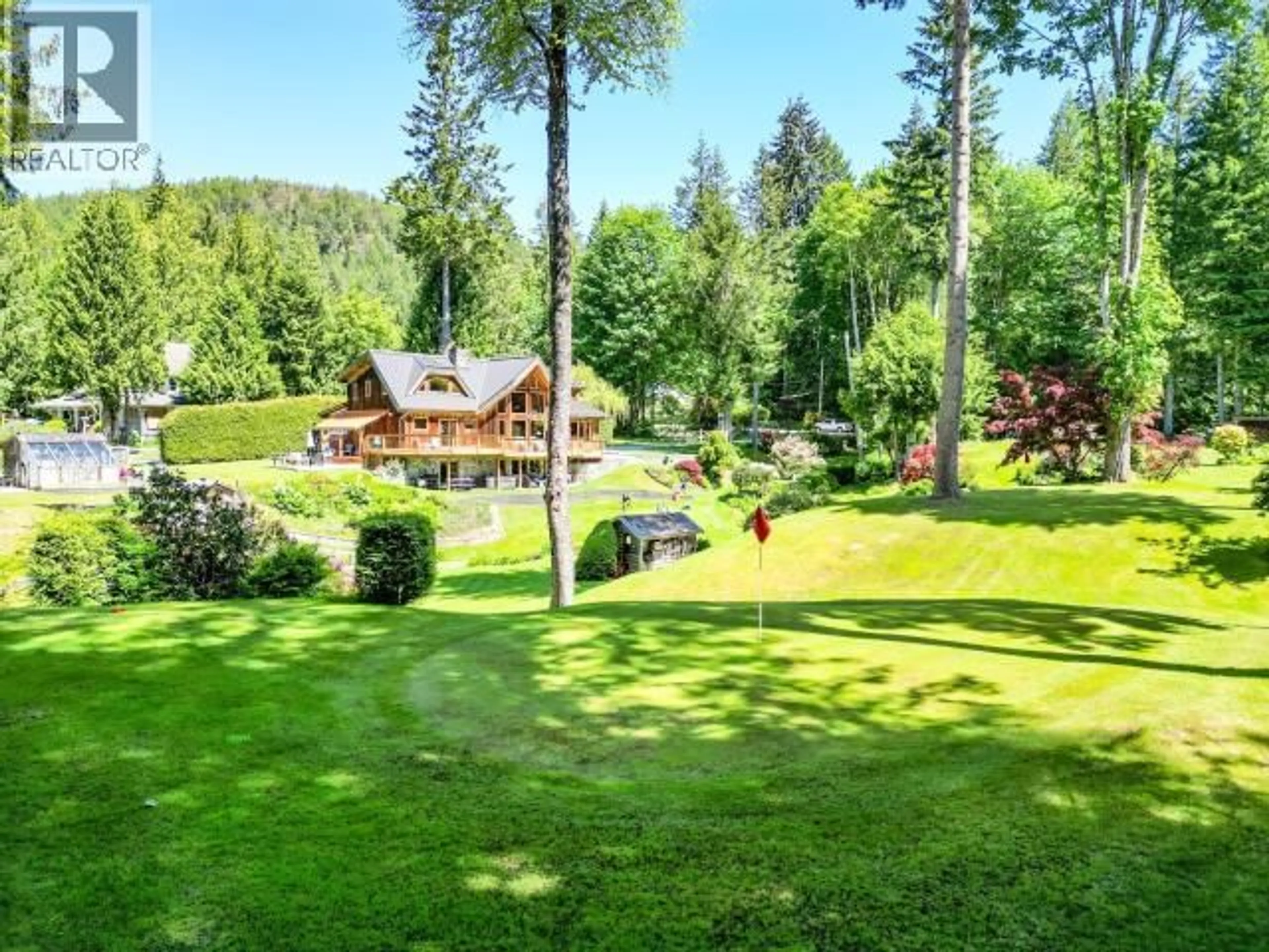 A pic from outside/outdoor area/front of a property/back of a property/a pic from drone, forest/trees view for 5621 ALLEN AVE, Powell River British Columbia V8A4H9
