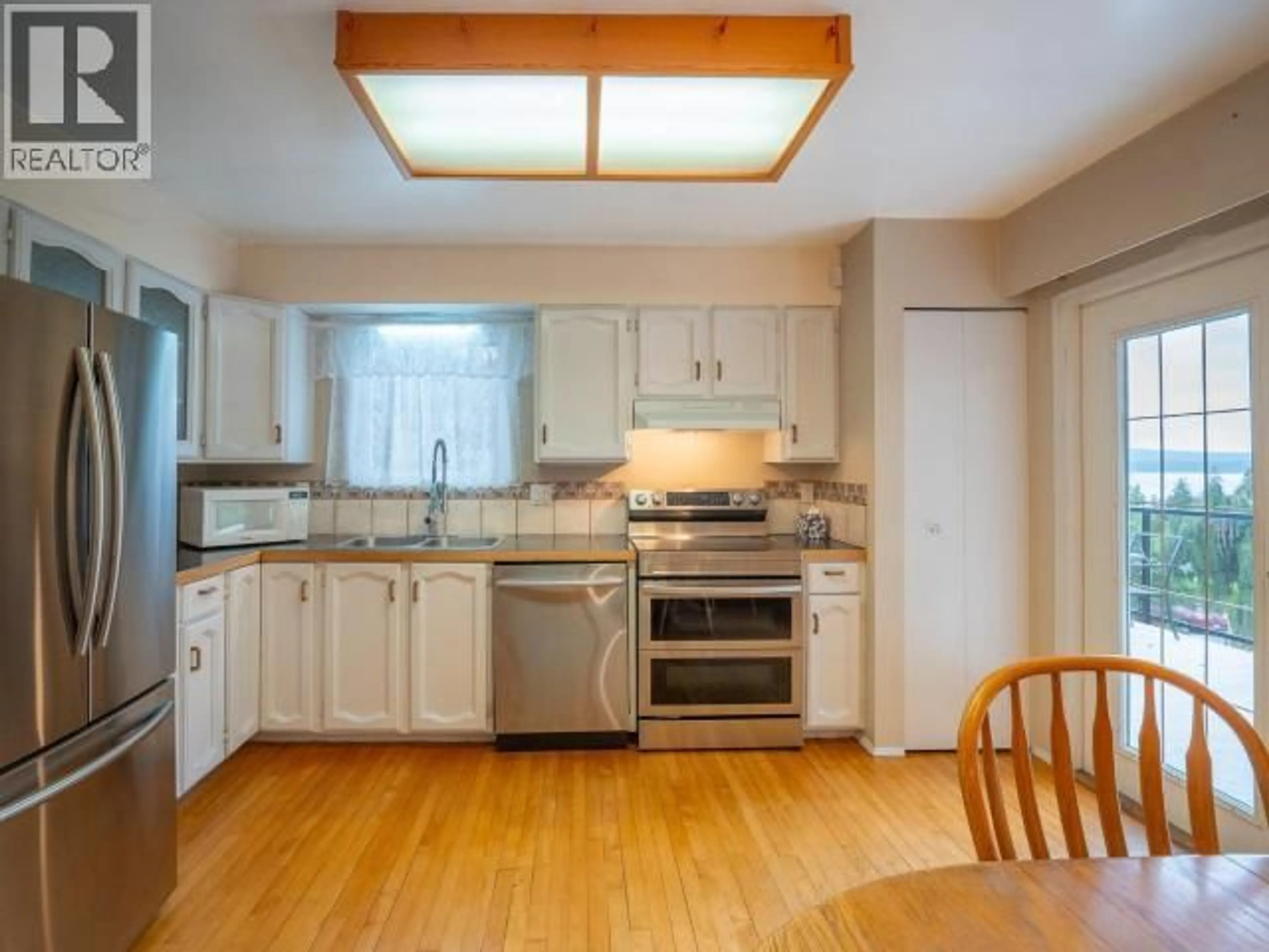 Standard kitchen, wood/laminate floor for 6975 TERRACE STREET, Powell River British Columbia V8A1H3