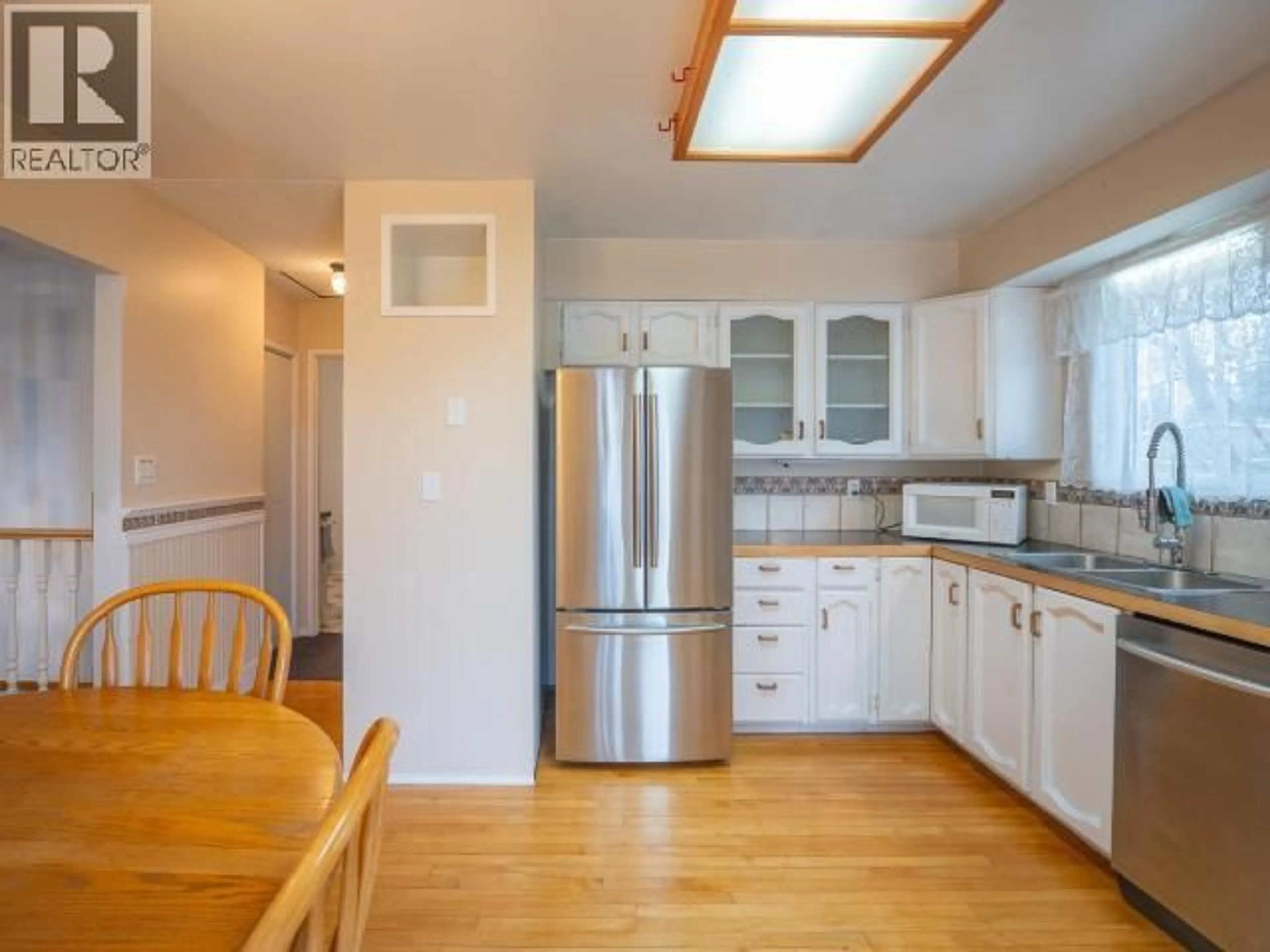 Standard kitchen, wood/laminate floor for 6975 TERRACE STREET, Powell River British Columbia V8A1H3