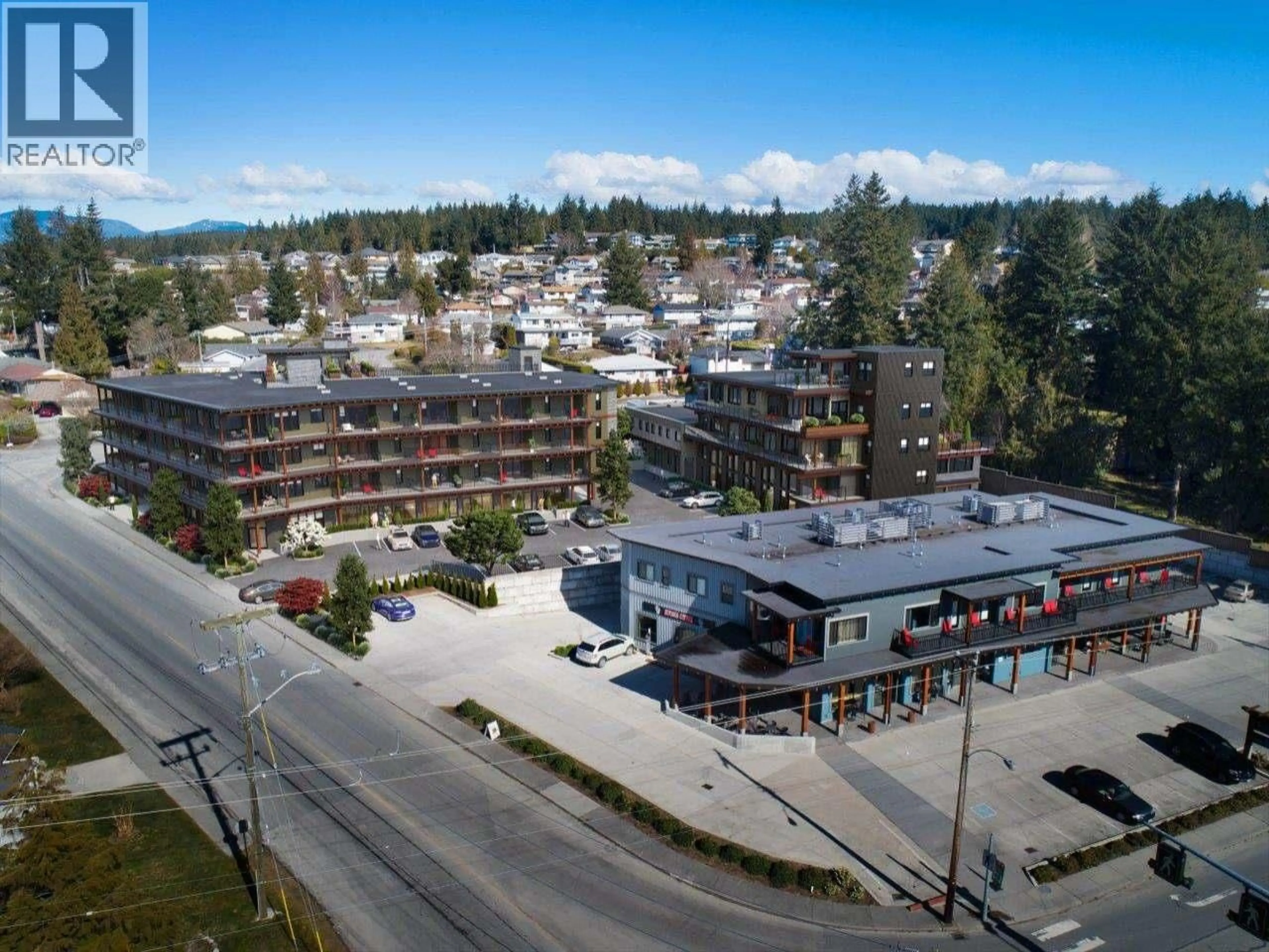 A pic from outside/outdoor area/front of a property/back of a property/a pic from drone, mountain view for 204 - 7020 TOFINO STREET, Powell River British Columbia
