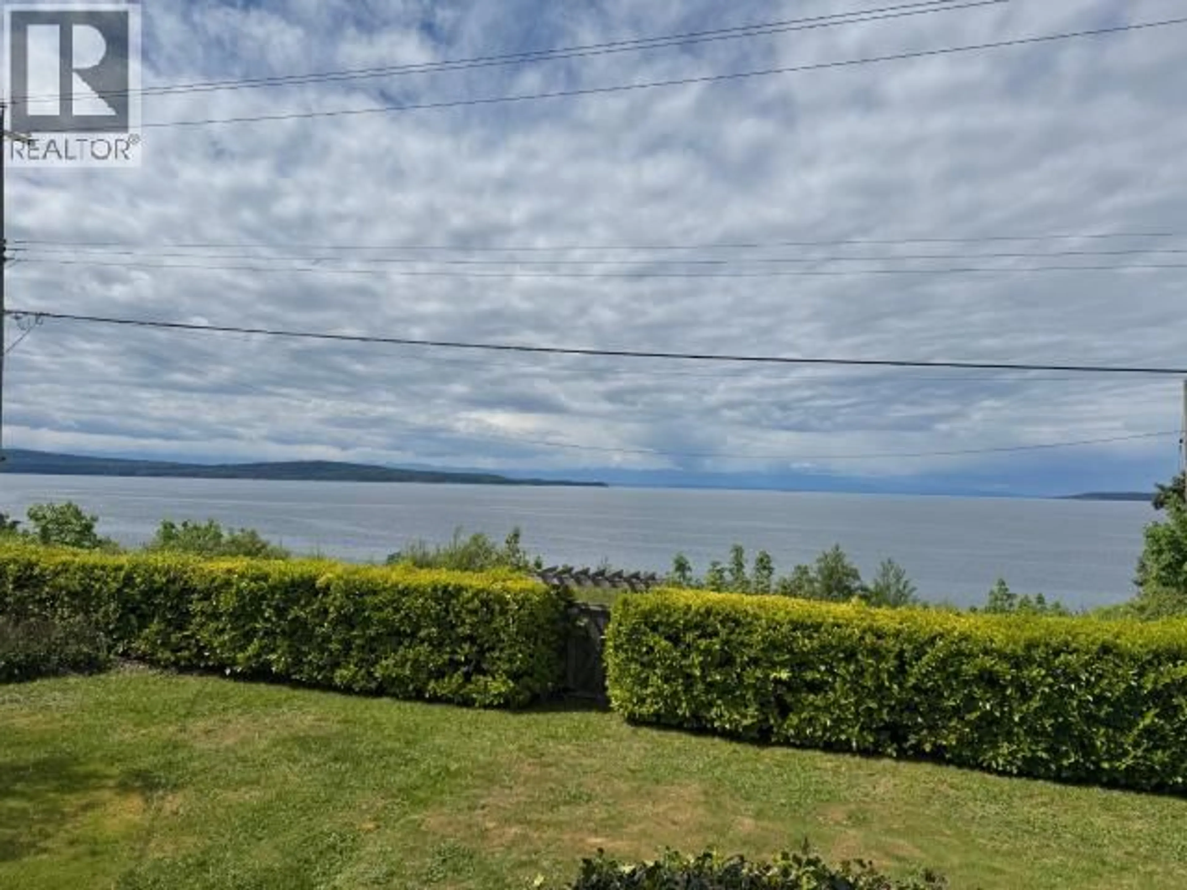 A pic from outside/outdoor area/front of a property/back of a property/a pic from drone, water/lake/river/ocean view for 4154 MARINE AVE, Powell River British Columbia V8A2J3