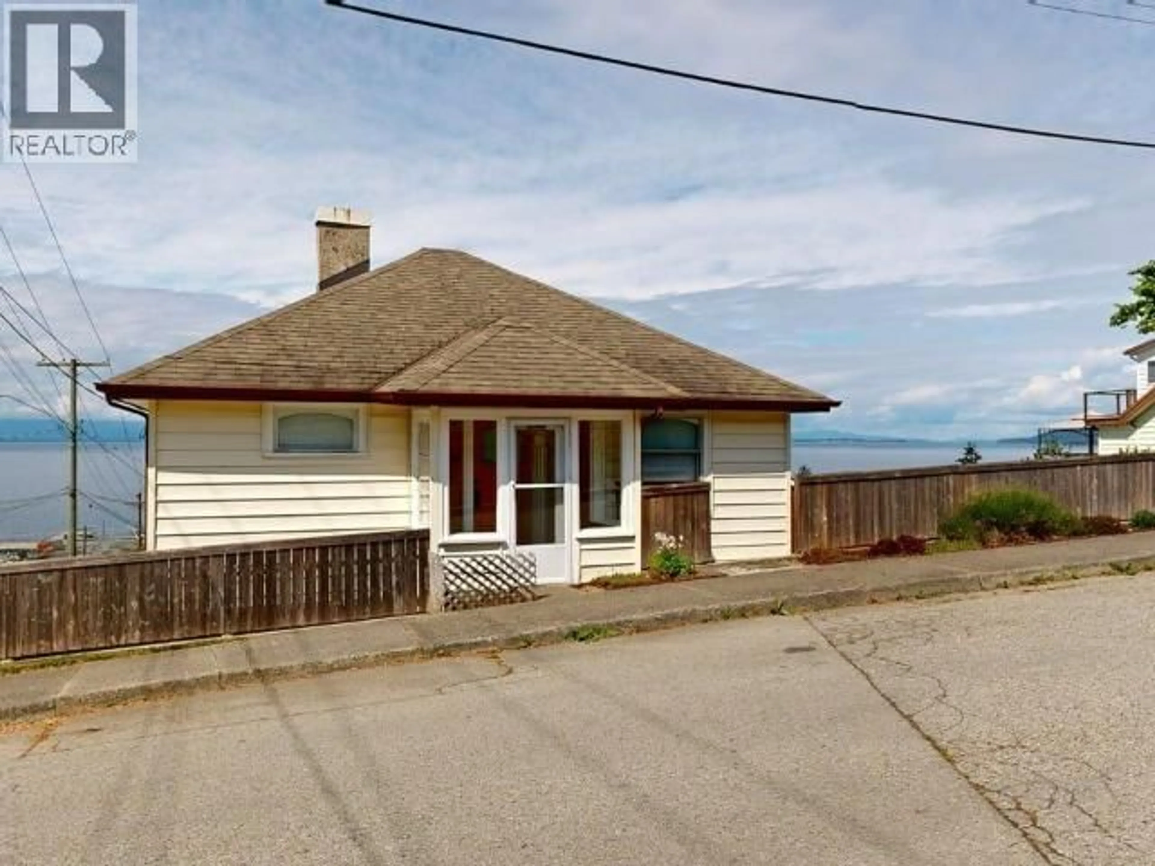 A pic from outside/outdoor area/front of a property/back of a property/a pic from drone, building for 4439 OMINECA AVE, Powell River British Columbia V8A2P8