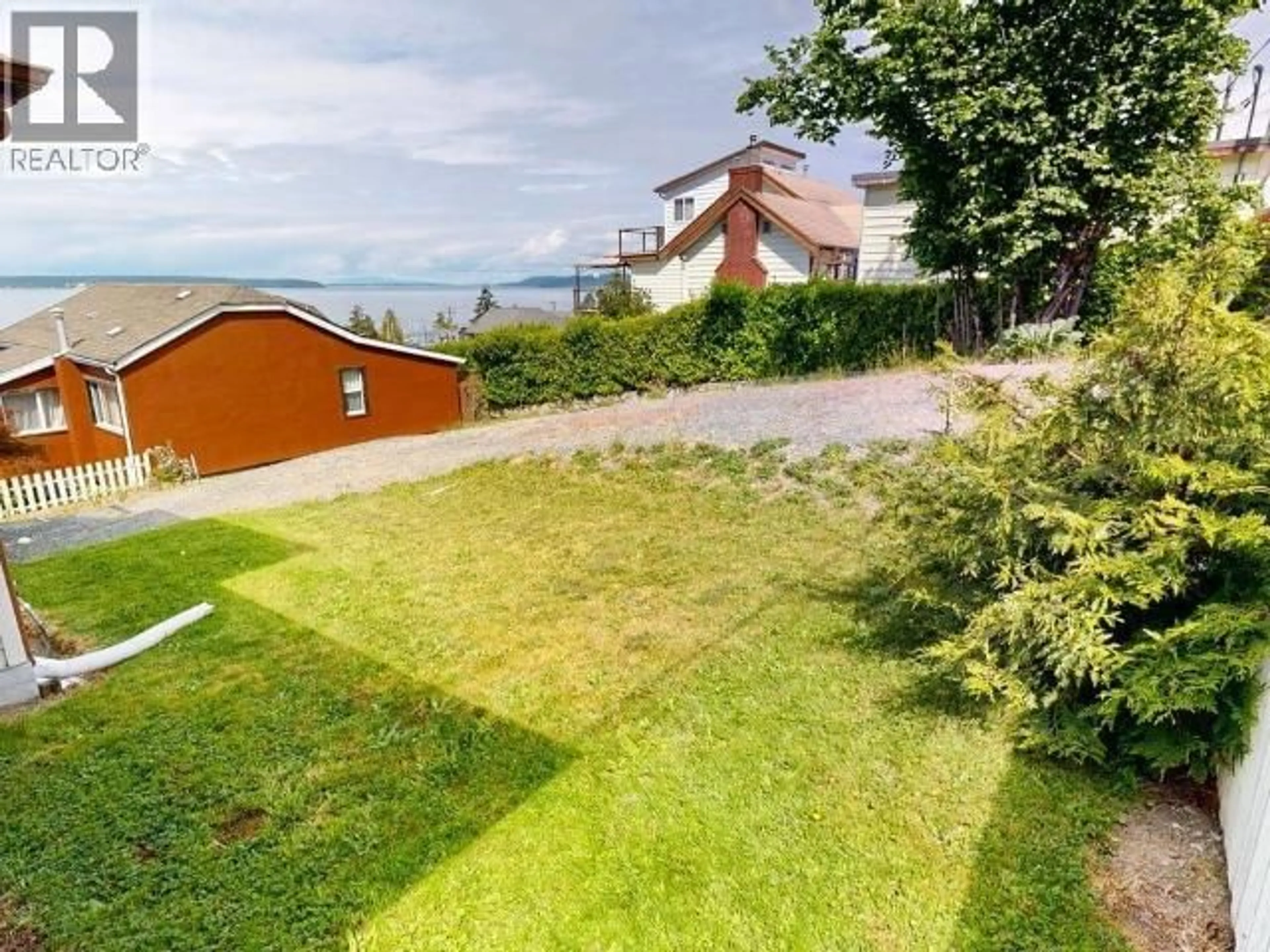 A pic from outside/outdoor area/front of a property/back of a property/a pic from drone, water/lake/river/ocean view for 4439 OMINECA AVE, Powell River British Columbia V8A2P8