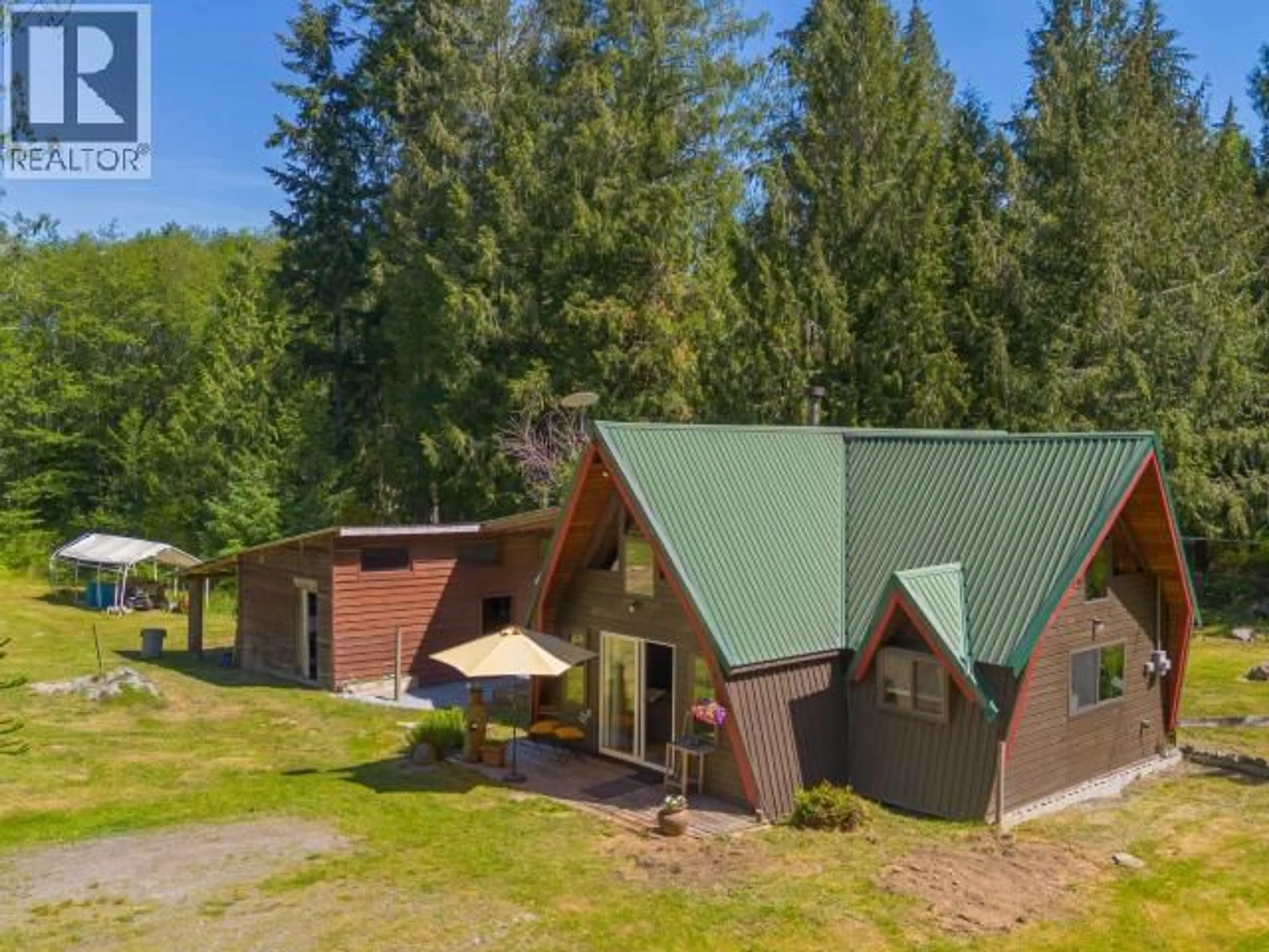 A pic from outside/outdoor area/front of a property/back of a property/a pic from drone, mountain view for 5029 PAXTON ROAD, Texada Island British Columbia V0N3K0
