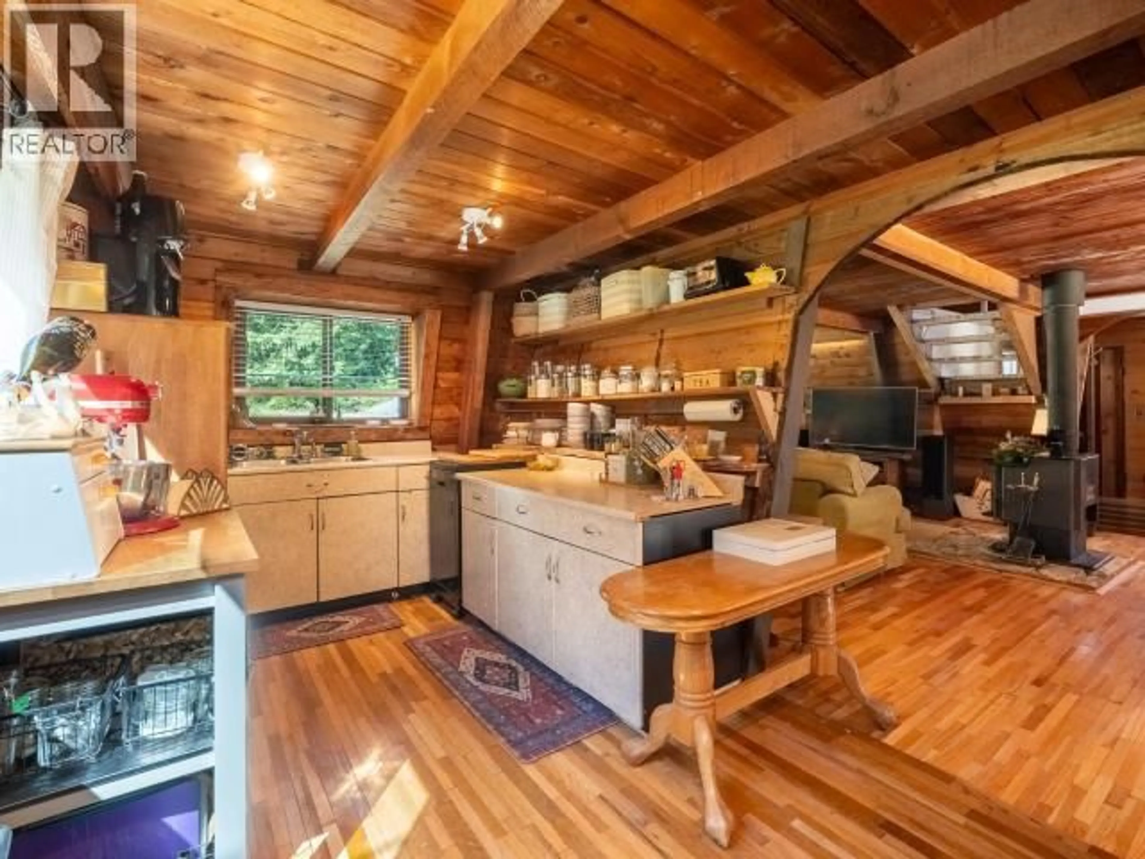 Rustic kitchen, wood/laminate floor for 5029 PAXTON ROAD, Texada Island British Columbia V0N3K0