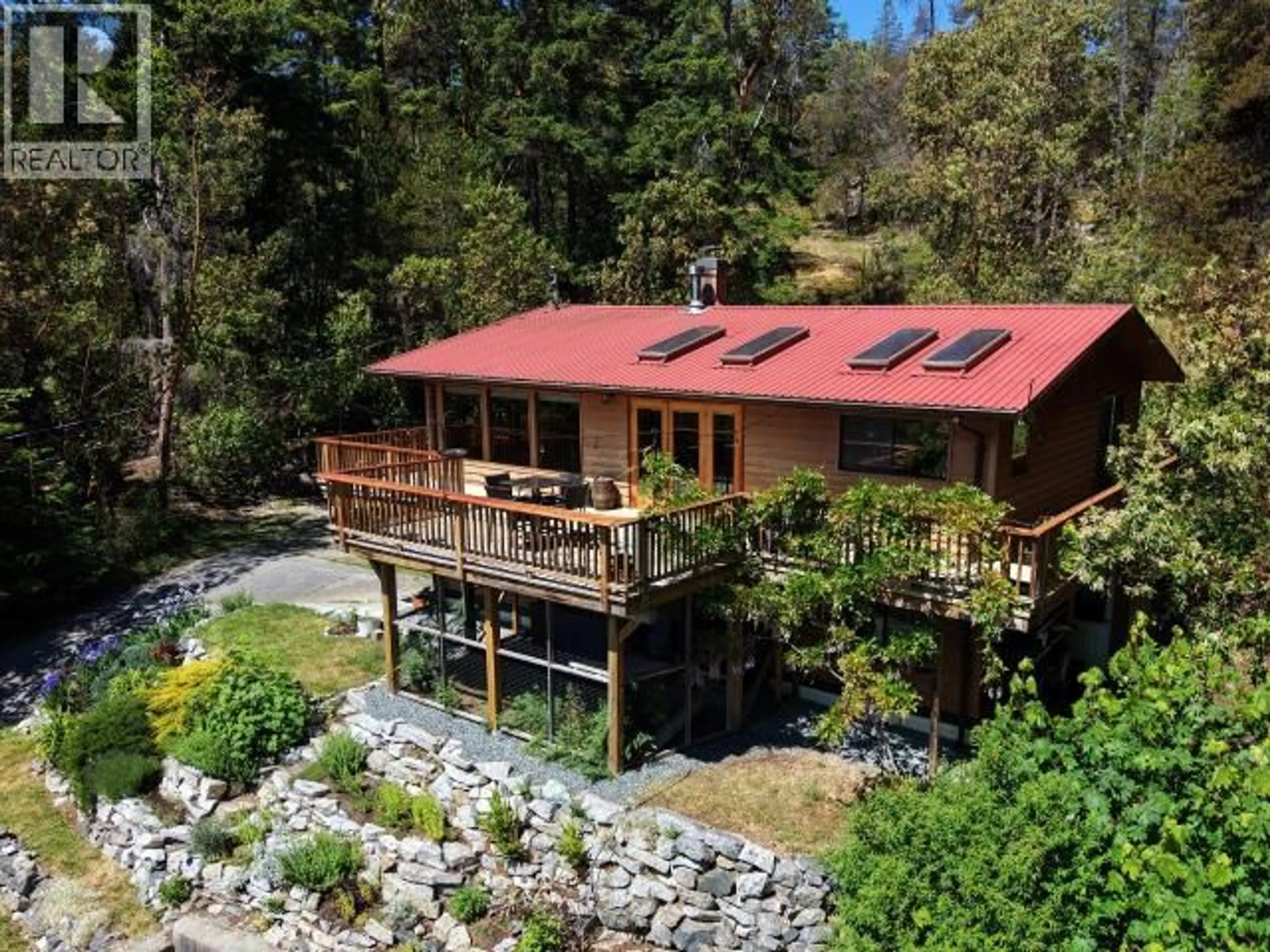 A pic from outside/outdoor area/front of a property/back of a property/a pic from drone, unknown for 4108 HIGHWAY 101, Powell River British Columbia V8A0C7