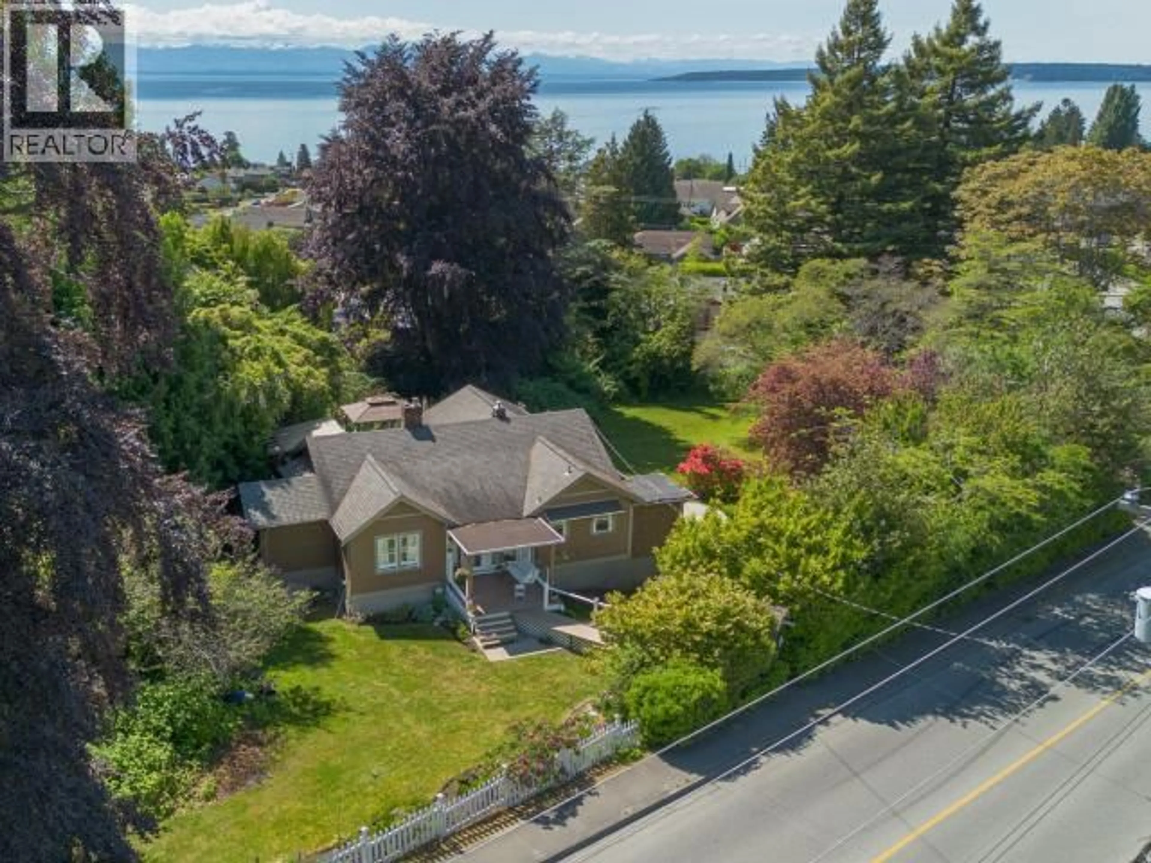 A pic from outside/outdoor area/front of a property/back of a property/a pic from drone, water/lake/river/ocean view for 4215 WESTVIEW AVE, Powell River British Columbia V8A3J2
