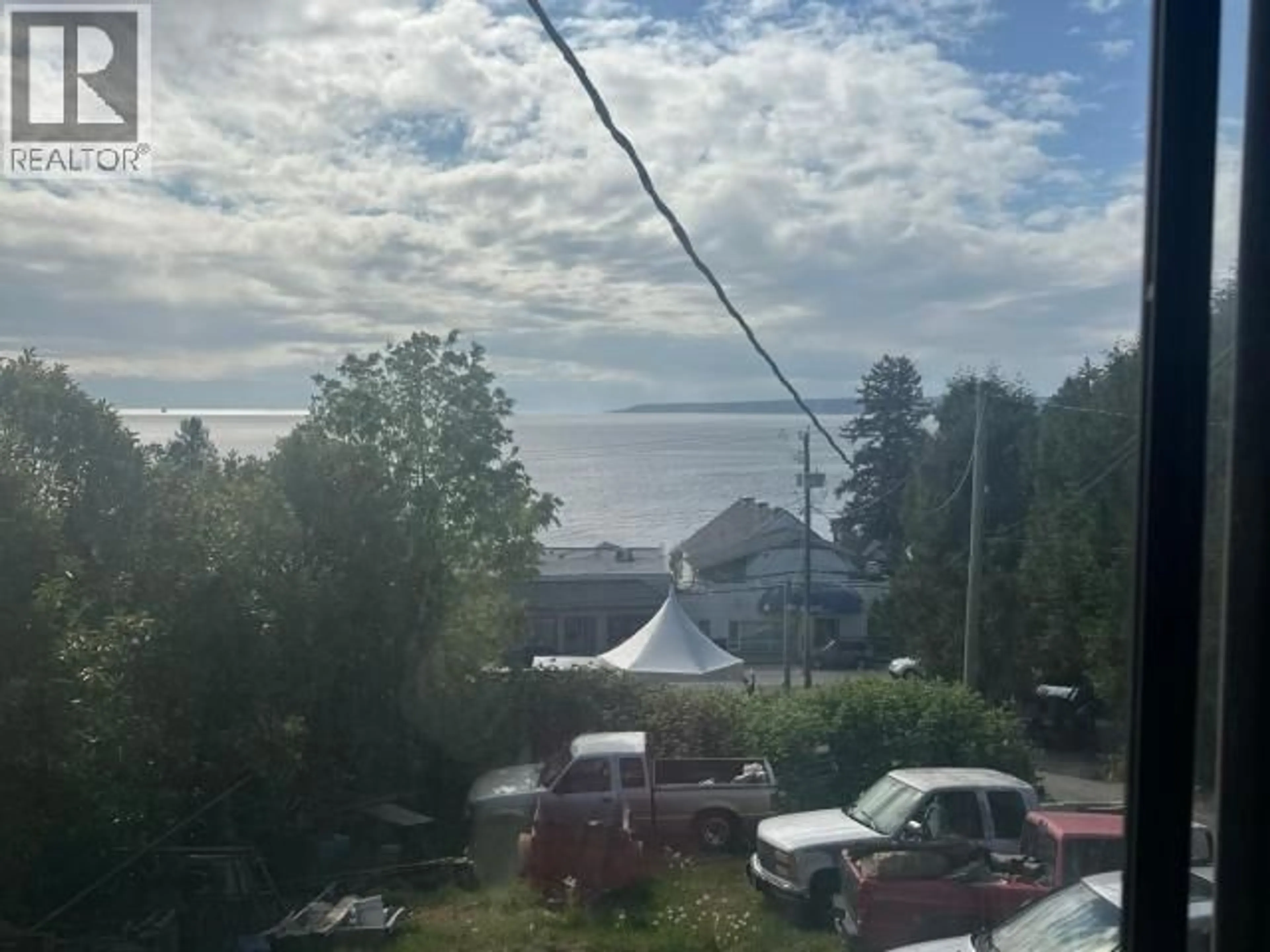 A pic from outside/outdoor area/front of a property/back of a property/a pic from drone, water/lake/river/ocean view for 4584 MARINE AVE, Powell River British Columbia V8A2K6