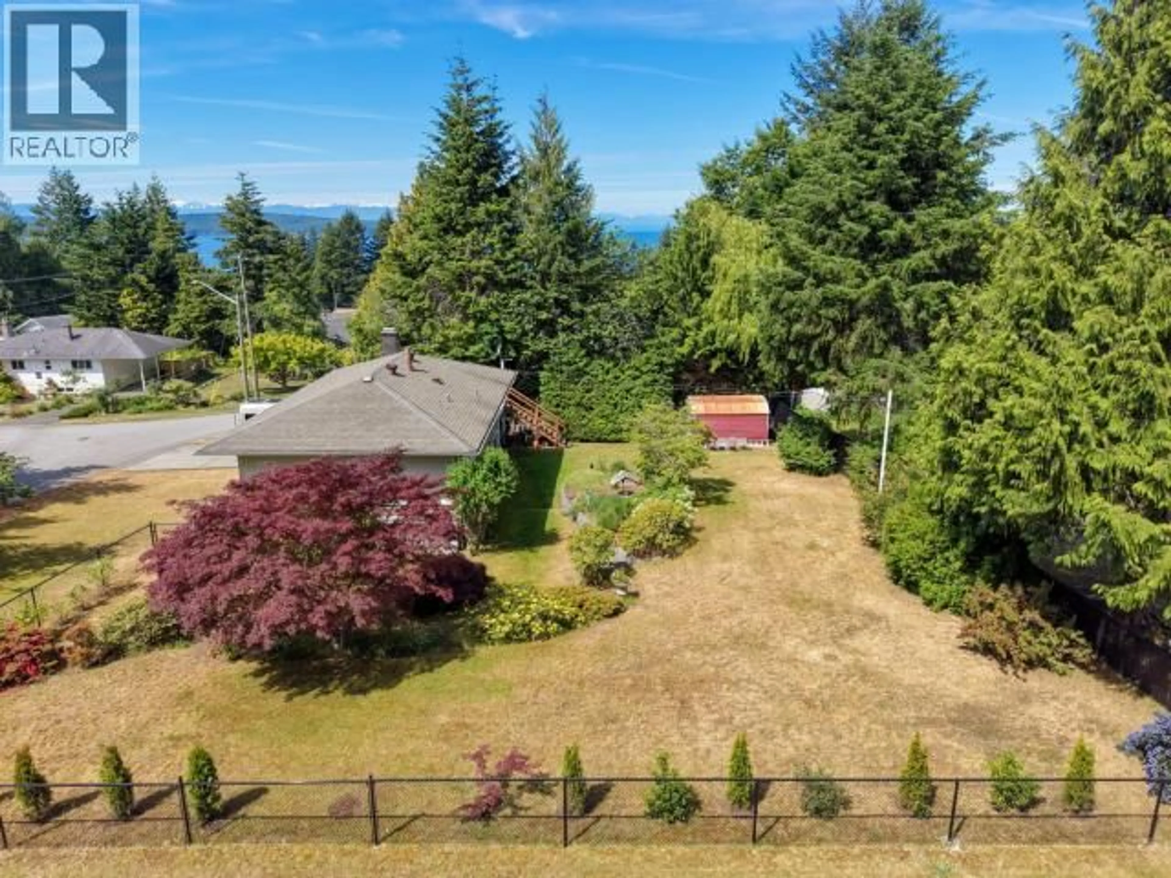 A pic from outside/outdoor area/front of a property/back of a property/a pic from drone, mountain view for 7117 TAHSIS STREET, Powell River British Columbia