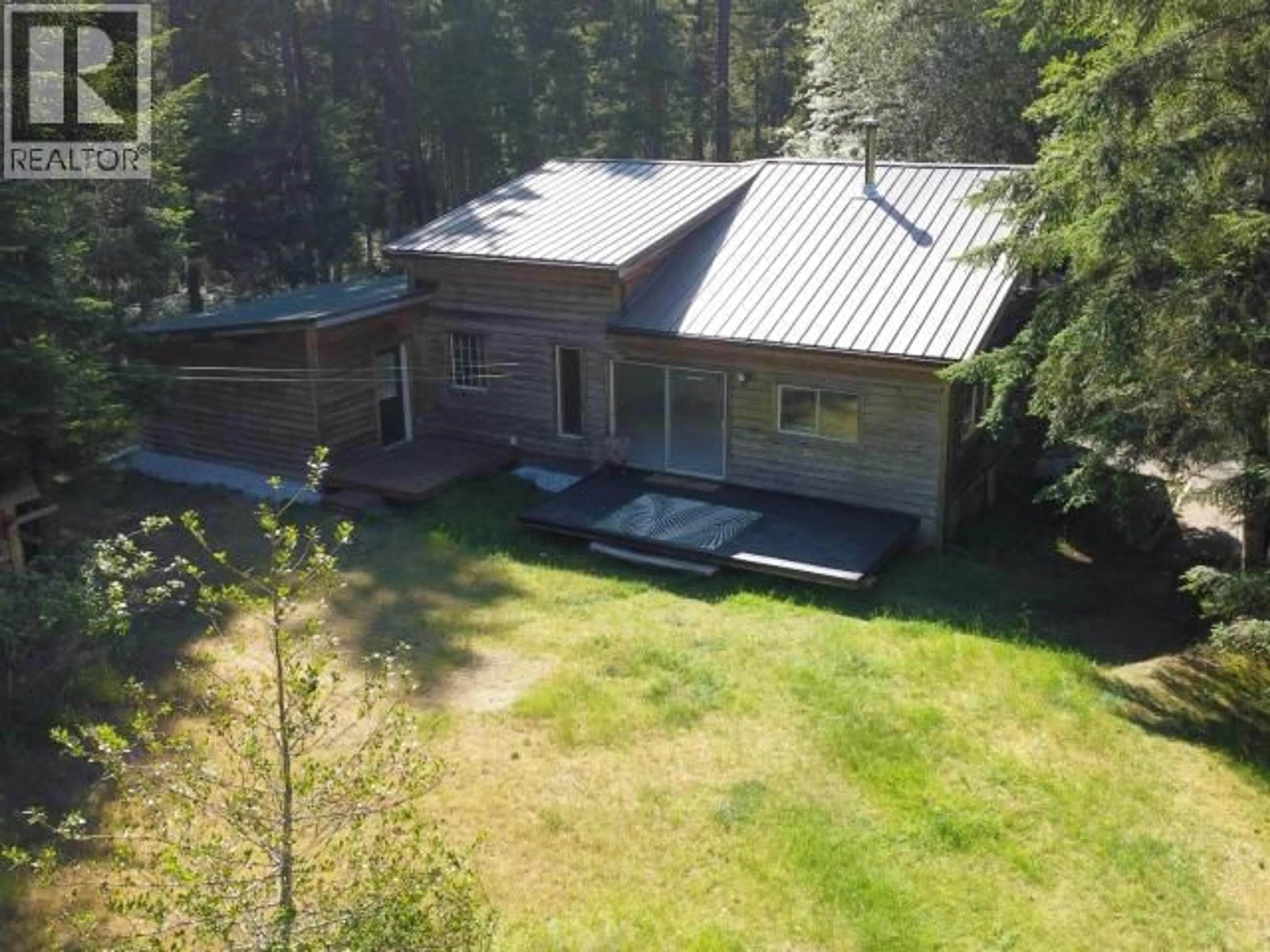 A pic from outside/outdoor area/front of a property/back of a property/a pic from drone, forest/trees view for 4313 GILLIES BAY RD ROAD, Texada Island British Columbia V0N3K0