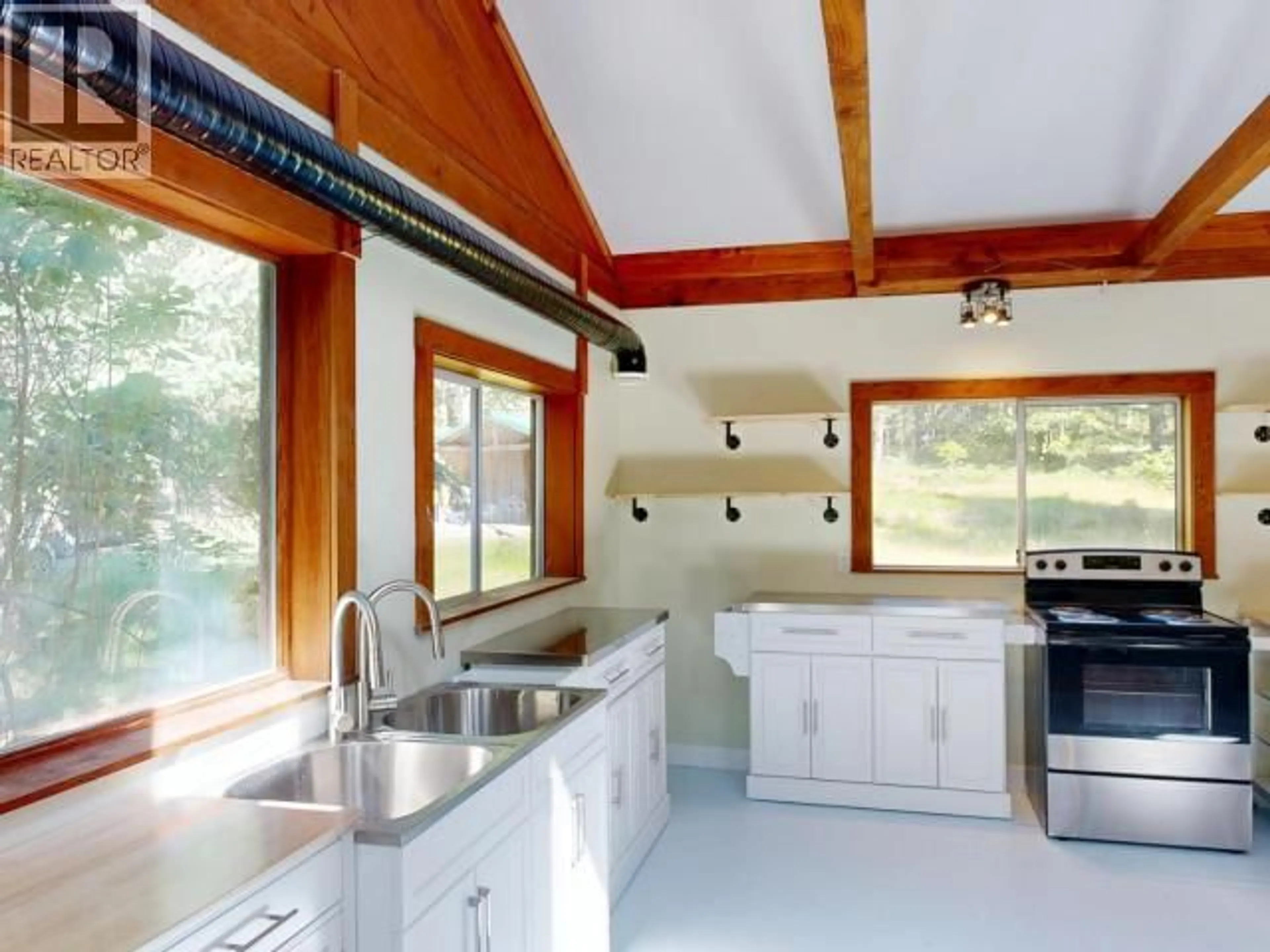 Open concept kitchen, ceramic/tile floor for 4313 GILLIES BAY RD ROAD, Texada Island British Columbia V0N3K0