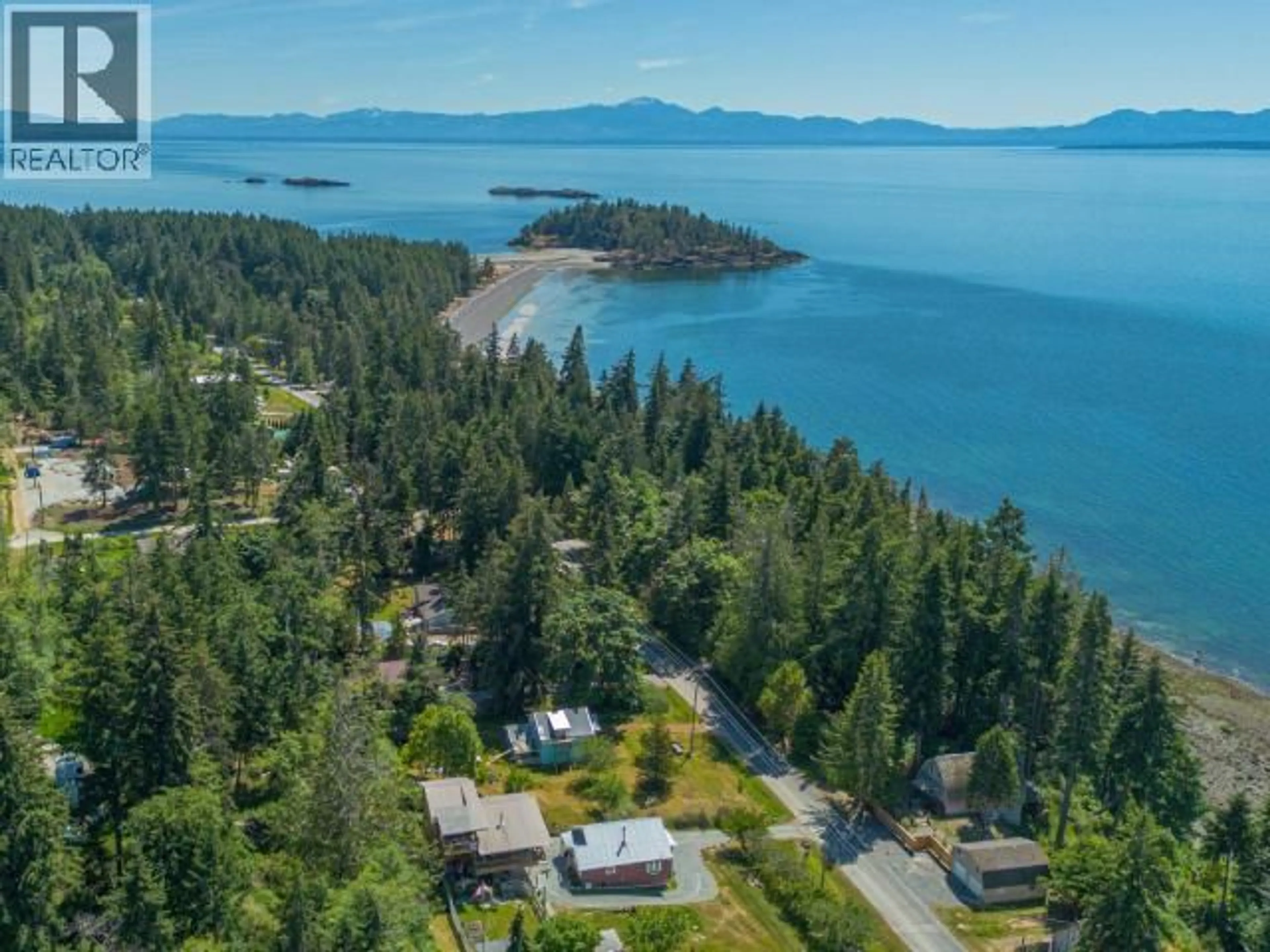 A pic from outside/outdoor area/front of a property/back of a property/a pic from drone, water/lake/river/ocean view for 5687 GILLIES BAY RD, Texada Island British Columbia