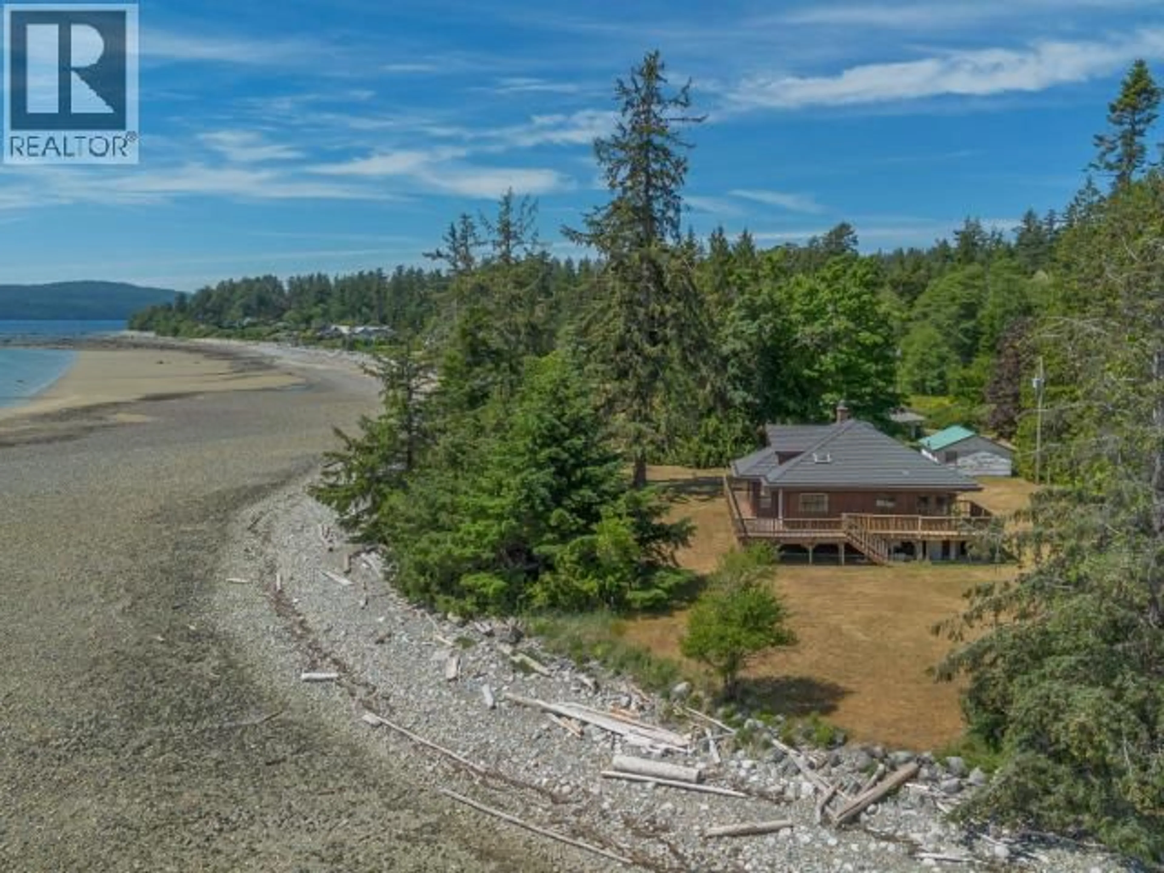 A pic from outside/outdoor area/front of a property/back of a property/a pic from drone, water/lake/river/ocean view for 10282 PATRICK ROAD, Powell River British Columbia V8A5C1