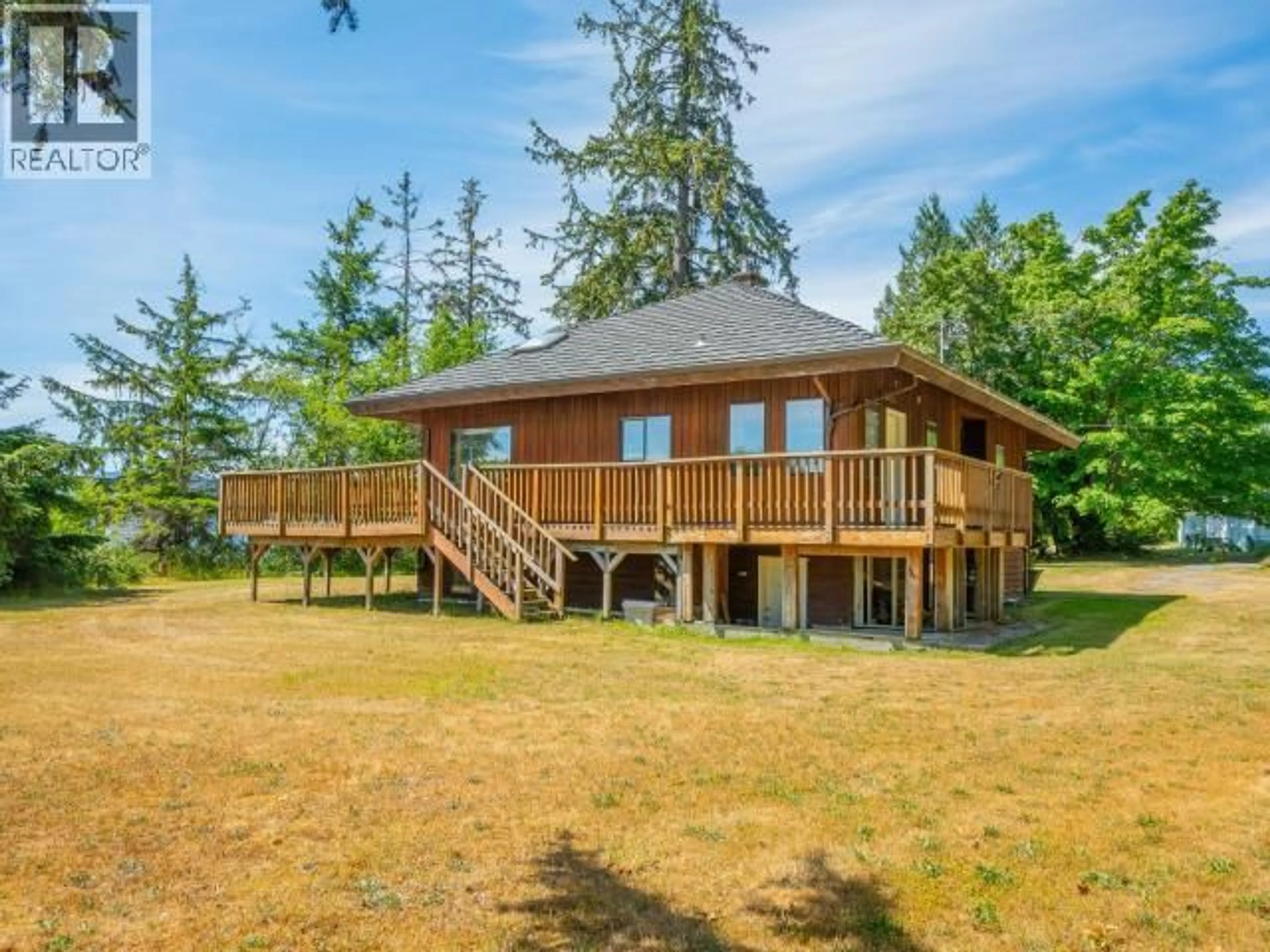 A pic from outside/outdoor area/front of a property/back of a property/a pic from drone, water/lake/river/ocean view for 10282 PATRICK ROAD, Powell River British Columbia V8A5C1