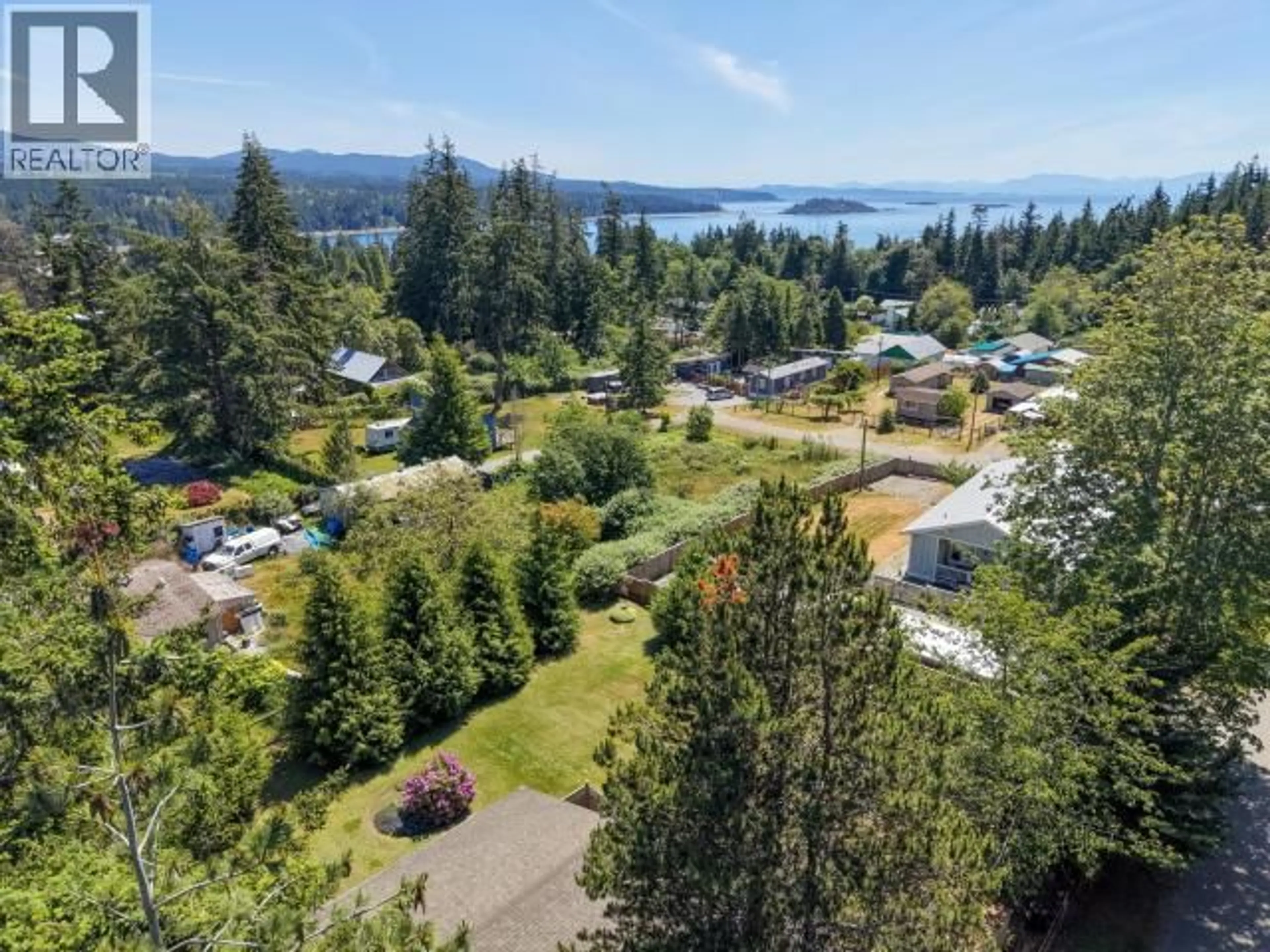 A pic from outside/outdoor area/front of a property/back of a property/a pic from drone, water/lake/river/ocean view for 3010 OAK STREET, Texada Island British Columbia