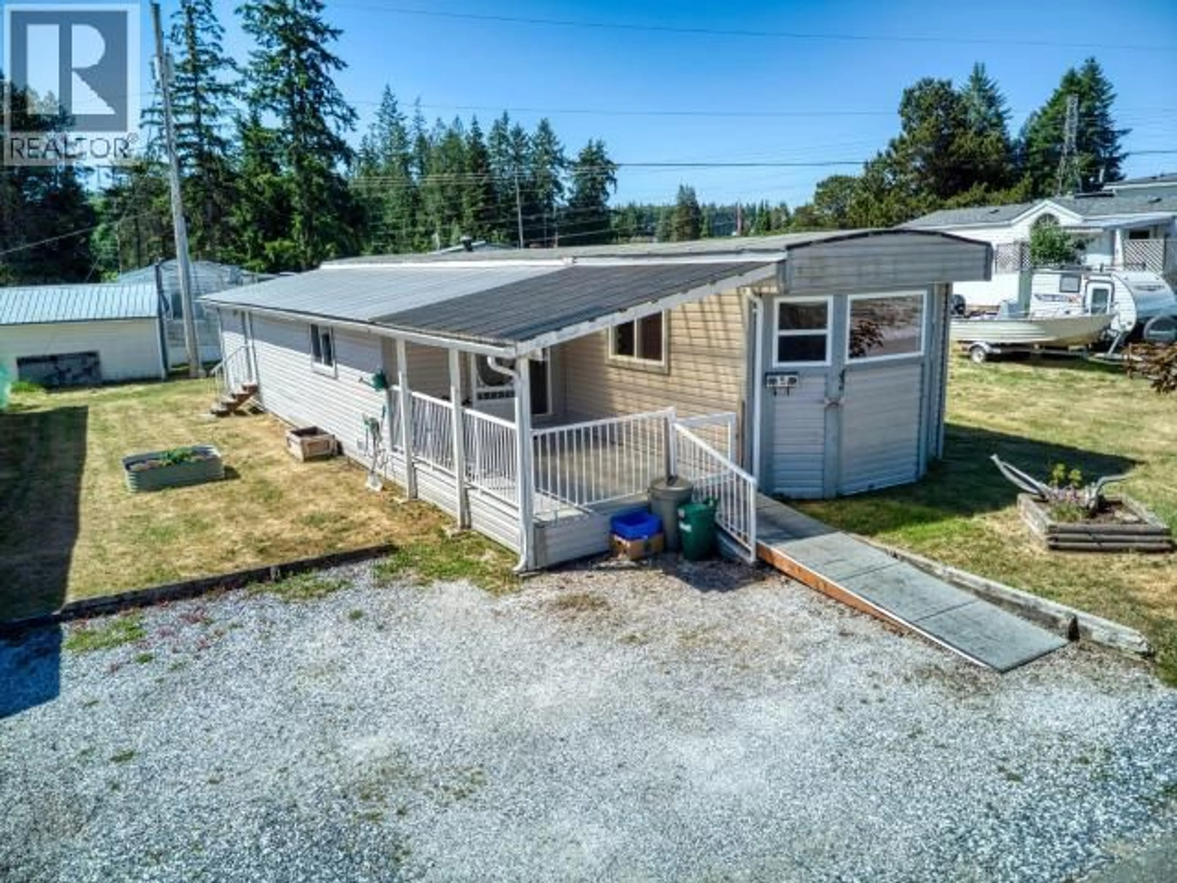 A pic from outside/outdoor area/front of a property/back of a property/a pic from drone, unknown for 4500 - 42 CLARIDGE ROAD, Powell River British Columbia V8A5N2