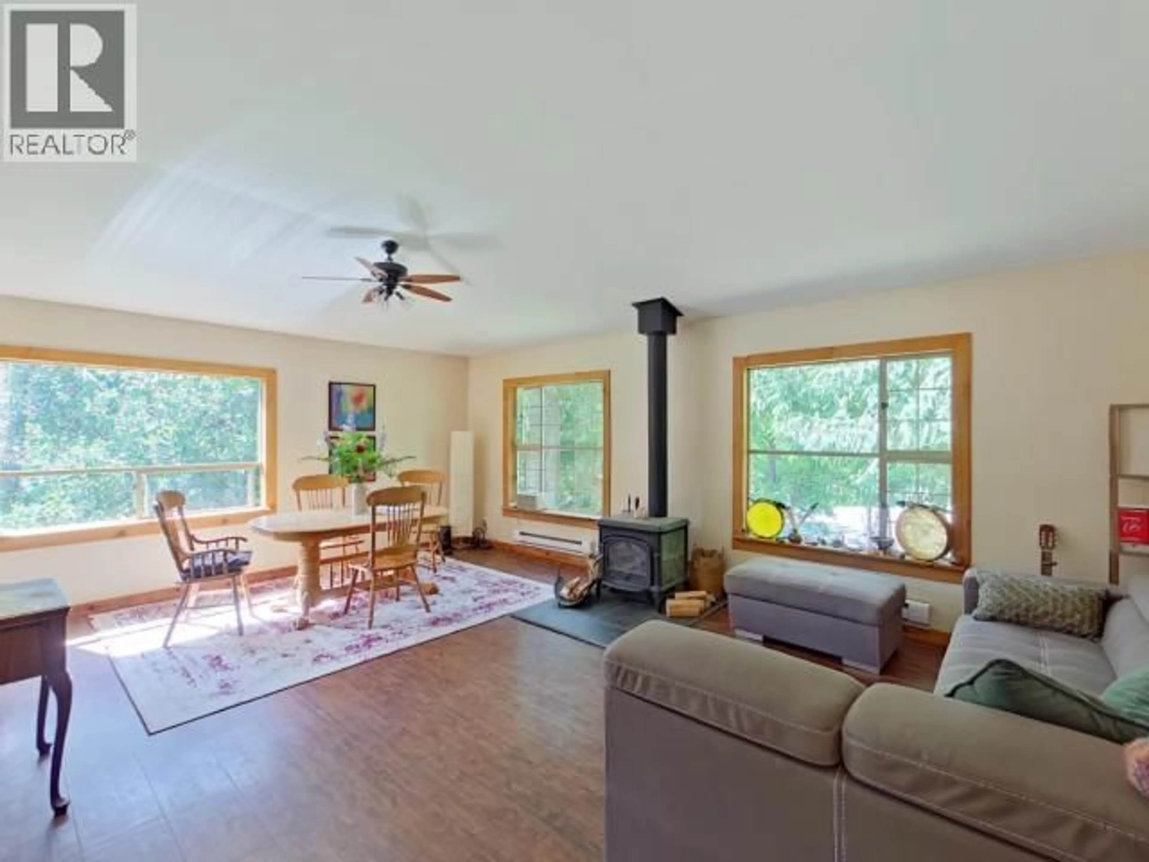 Living room with furniture, wood/laminate floor for 6980 SIENNA ROAD, Texada Island British Columbia V0N1W0