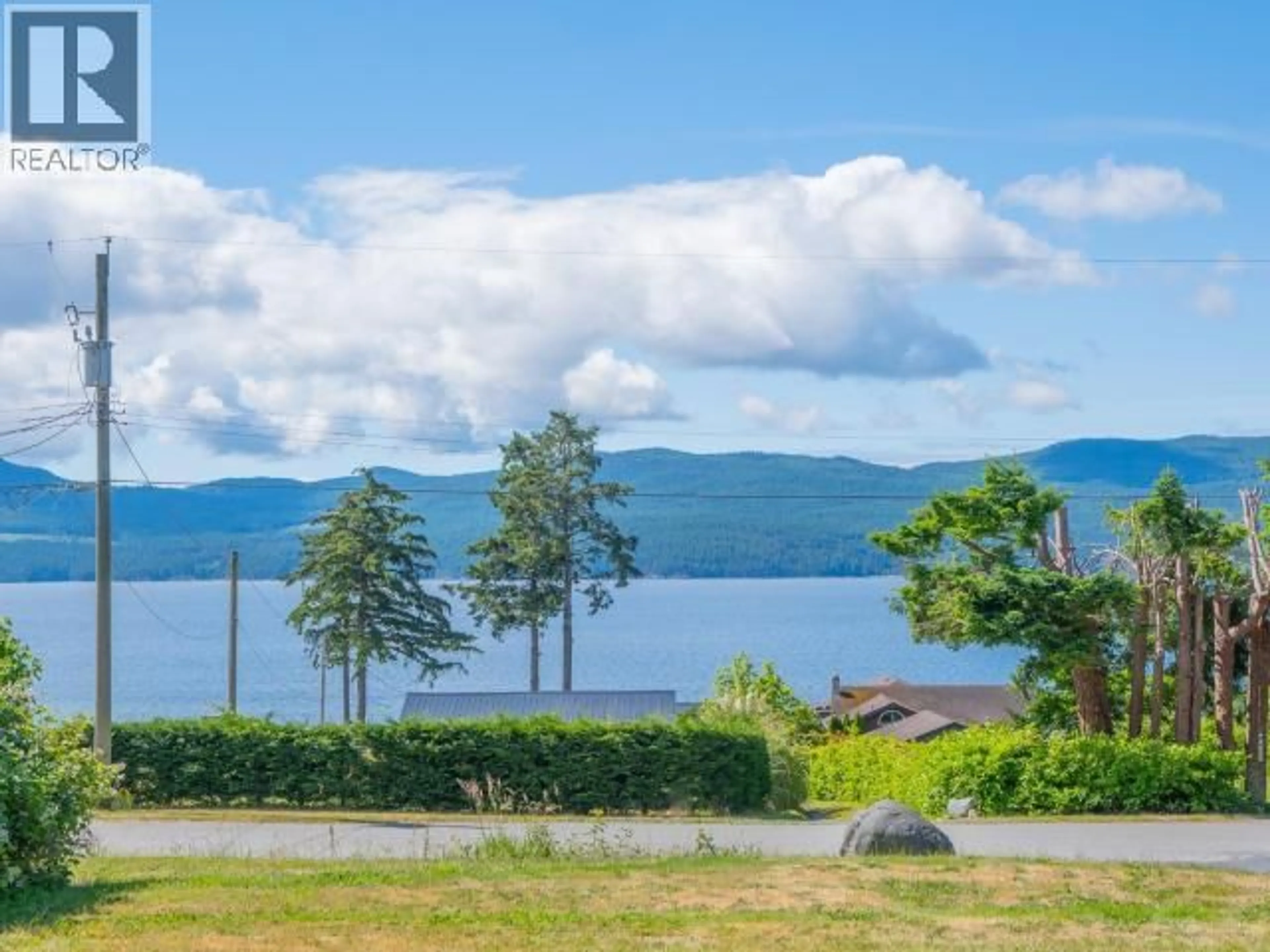 A pic from outside/outdoor area/front of a property/back of a property/a pic from drone, water/lake/river/ocean view for 9904 VIEW ROAD, Powell River British Columbia V8A0K2