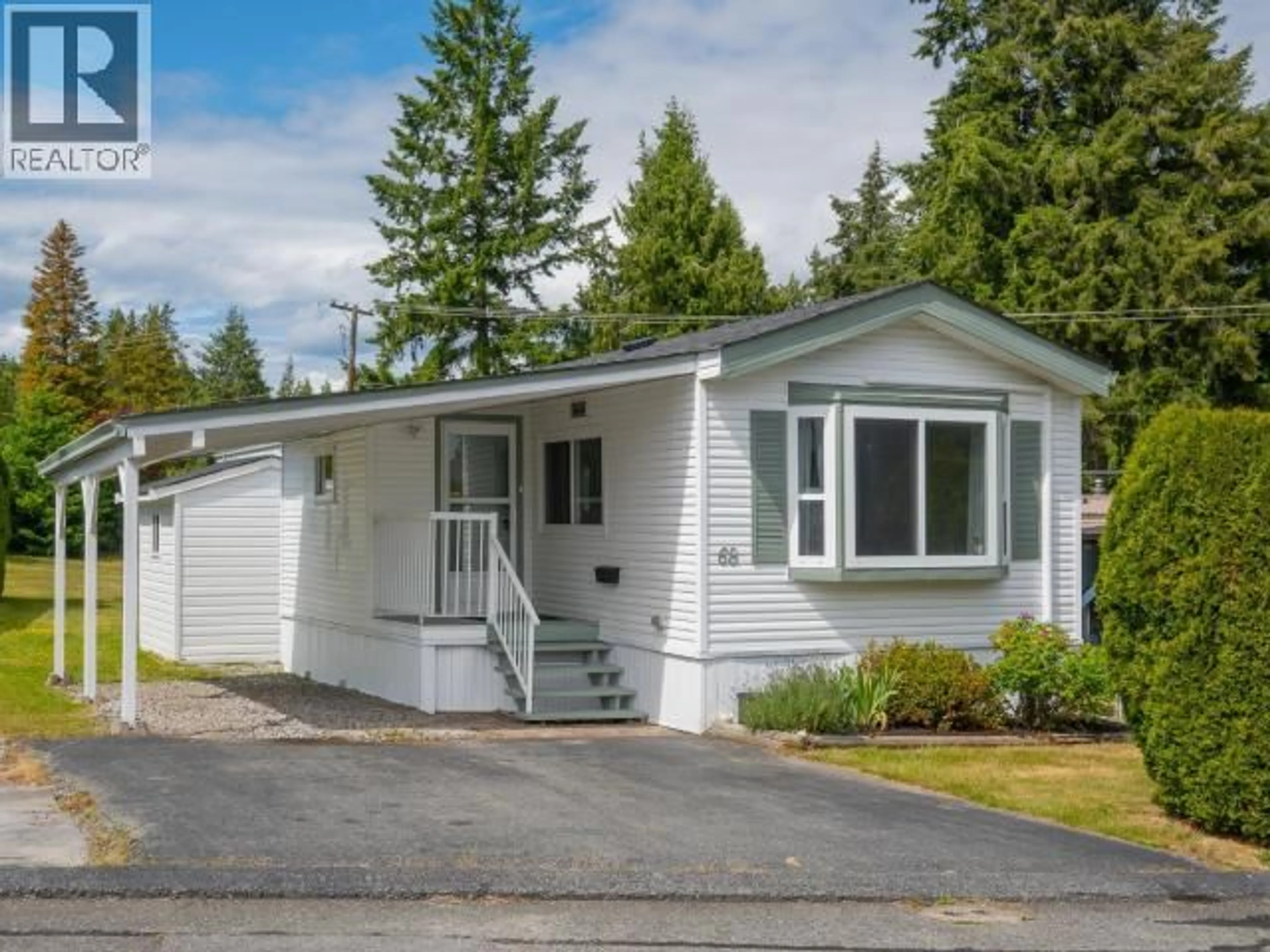 Home with vinyl exterior material, street for 68-7624 DUNCAN STREET, Powell River British Columbia V8A5L2