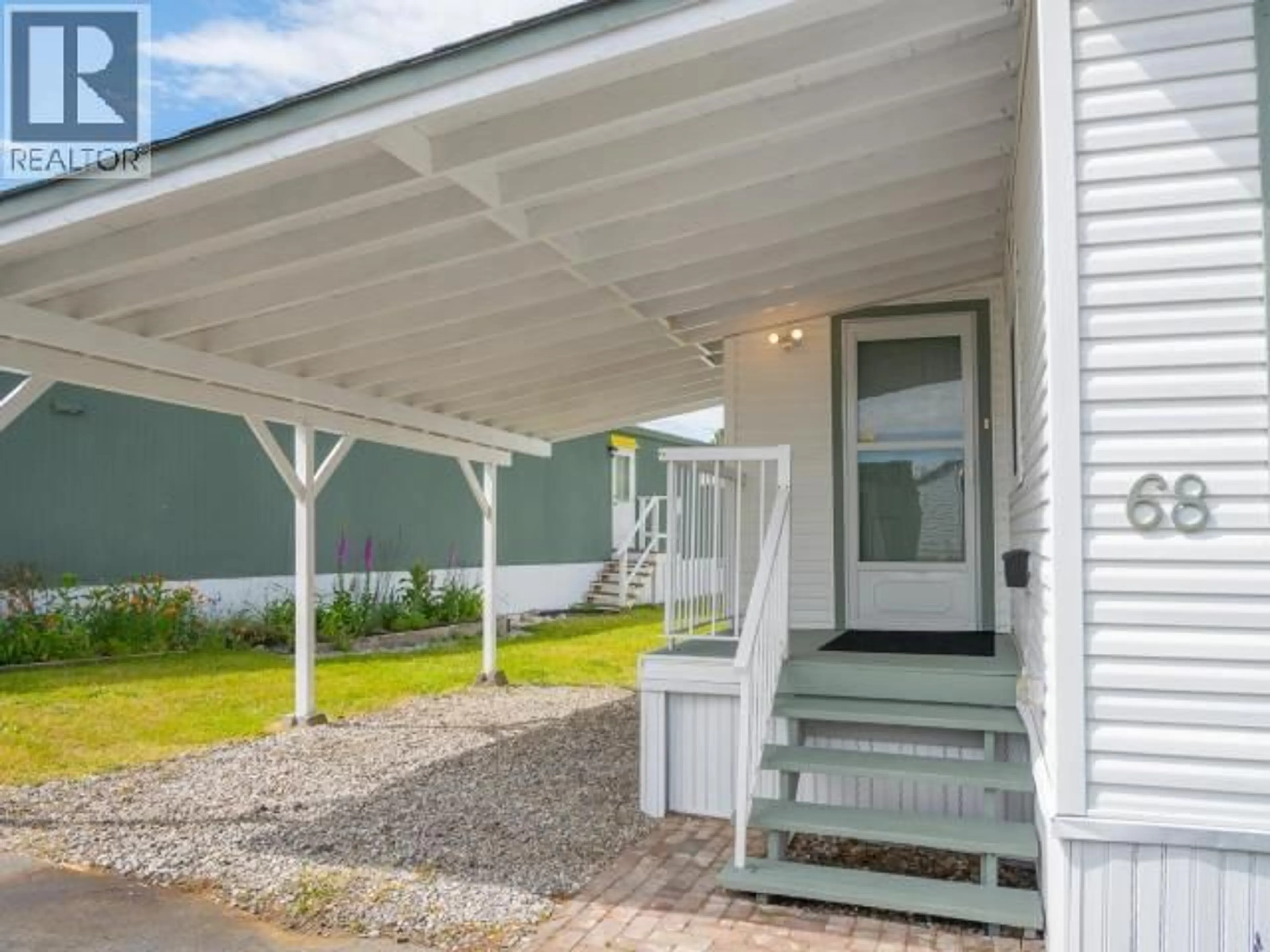 Home with vinyl exterior material, street for 68-7624 DUNCAN STREET, Powell River British Columbia V8A5L2