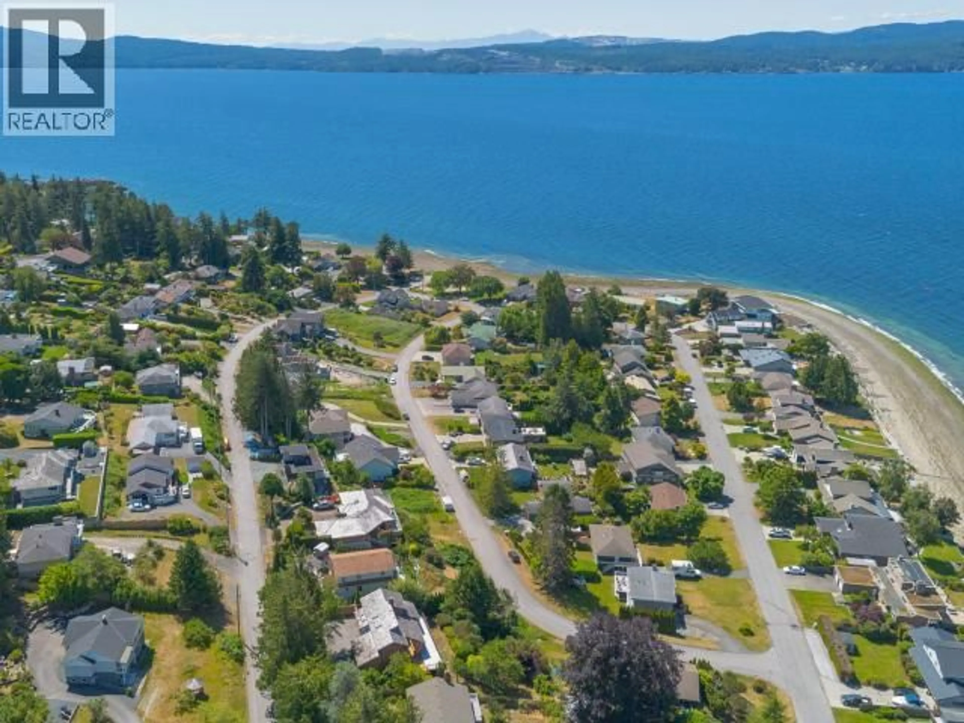 A pic from outside/outdoor area/front of a property/back of a property/a pic from drone, water/lake/river/ocean view for 3377 MALASPINA AVE, Powell River British Columbia V8A5J2