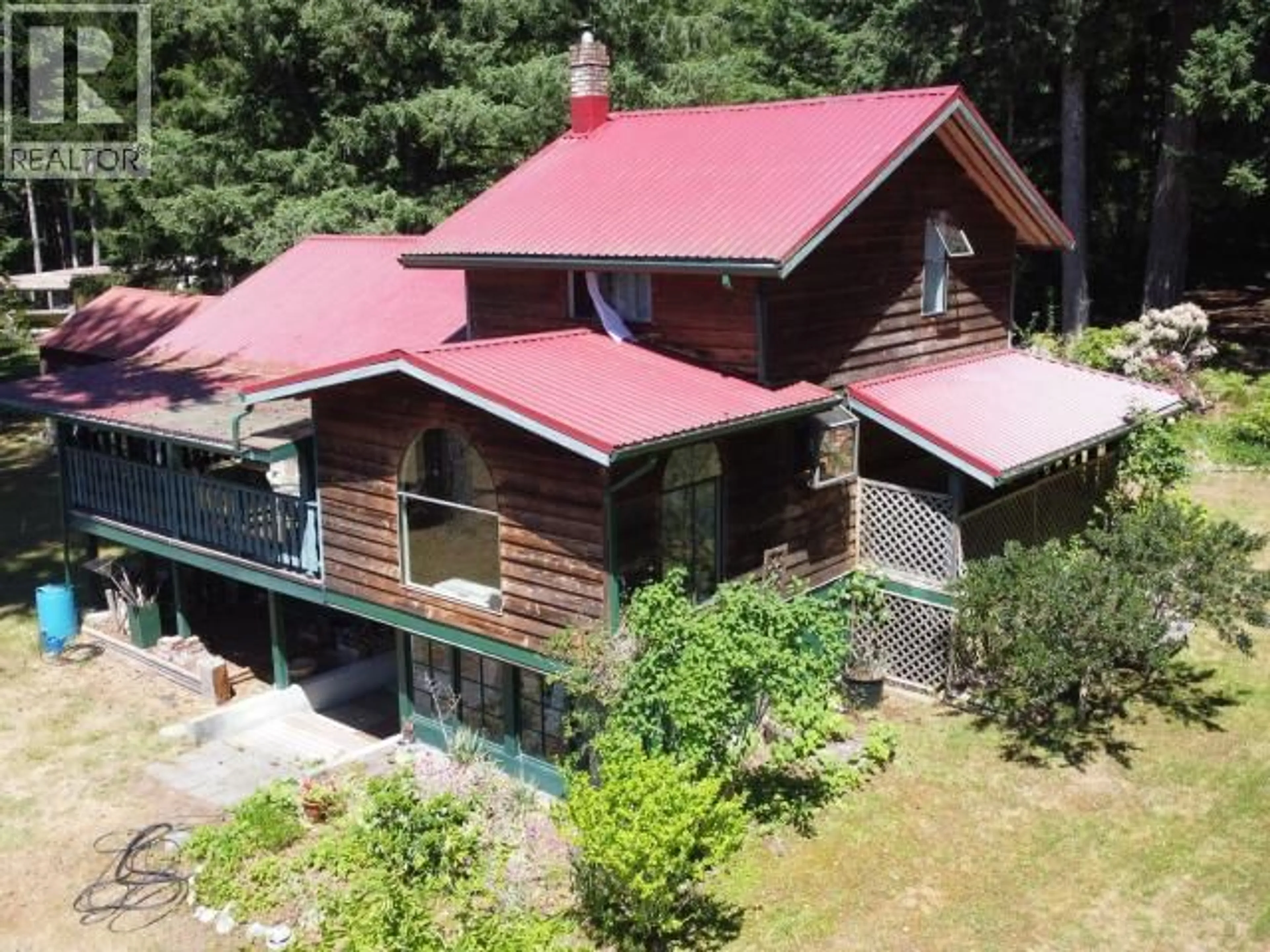A pic from outside/outdoor area/front of a property/back of a property/a pic from drone, building for 11109 DOLMAGE ROAD, Powell River British Columbia V8A0N5