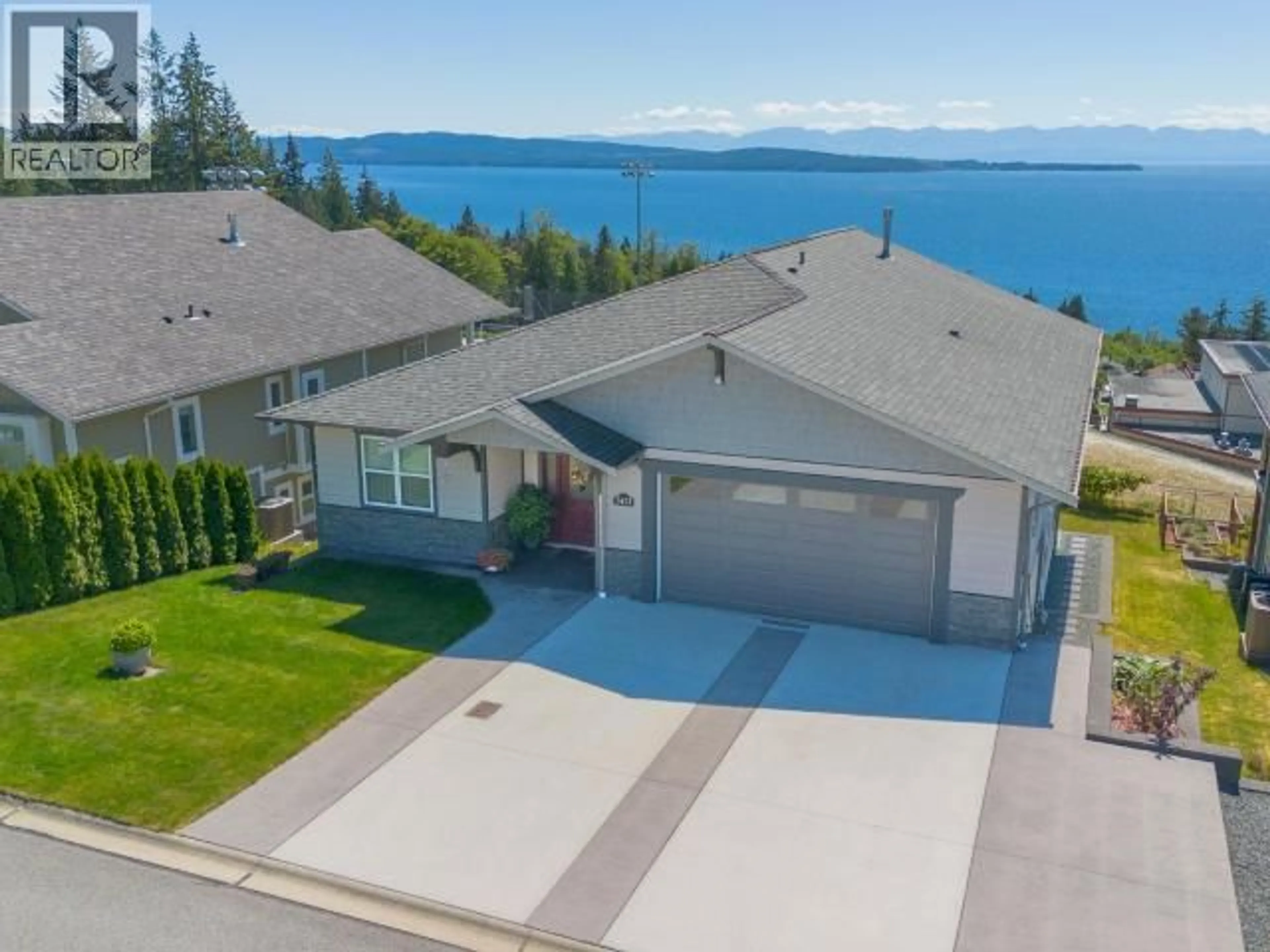 A pic from outside/outdoor area/front of a property/back of a property/a pic from drone, water/lake/river/ocean view for 5423 HEMLOCK STREET, Powell River British Columbia V8A0T7