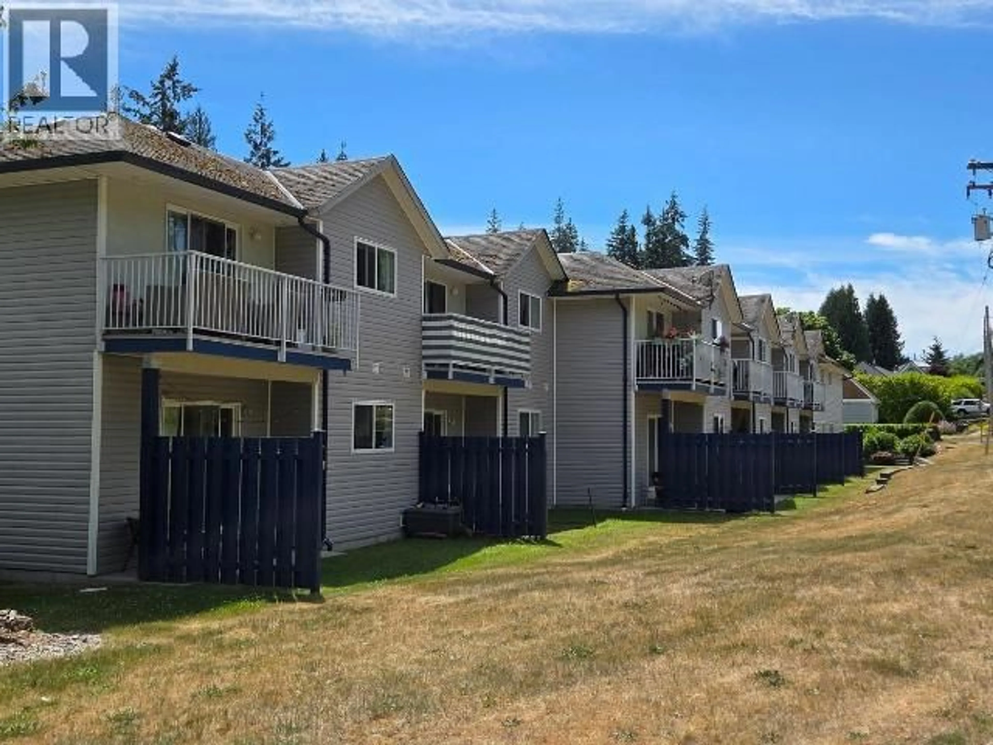 A pic from outside/outdoor area/front of a property/back of a property/a pic from drone, unknown for 108 - 5680 ORTONA AVE, Powell River British Columbia V8A5S5