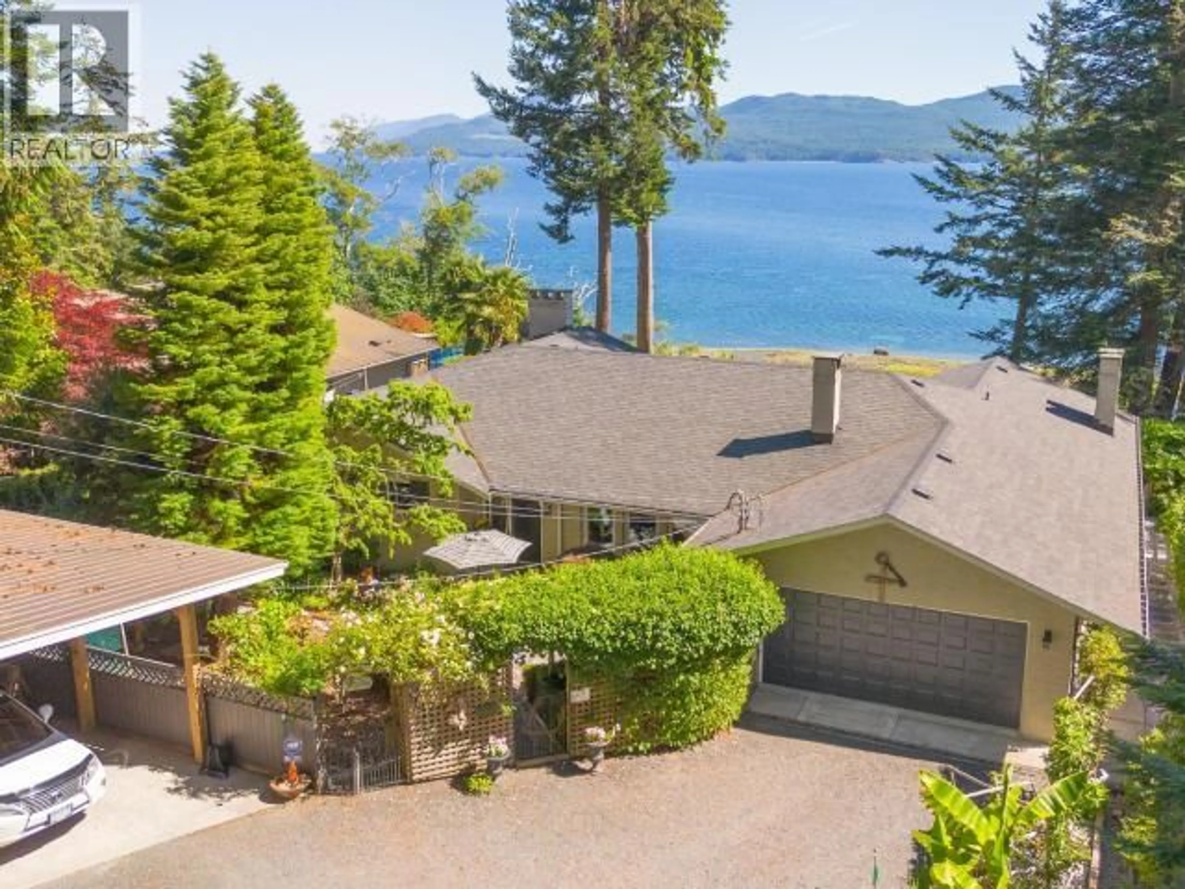 A pic from outside/outdoor area/front of a property/back of a property/a pic from drone, water/lake/river/ocean view for 9081 STAGER ROAD, Powell River British Columbia V8A0H6