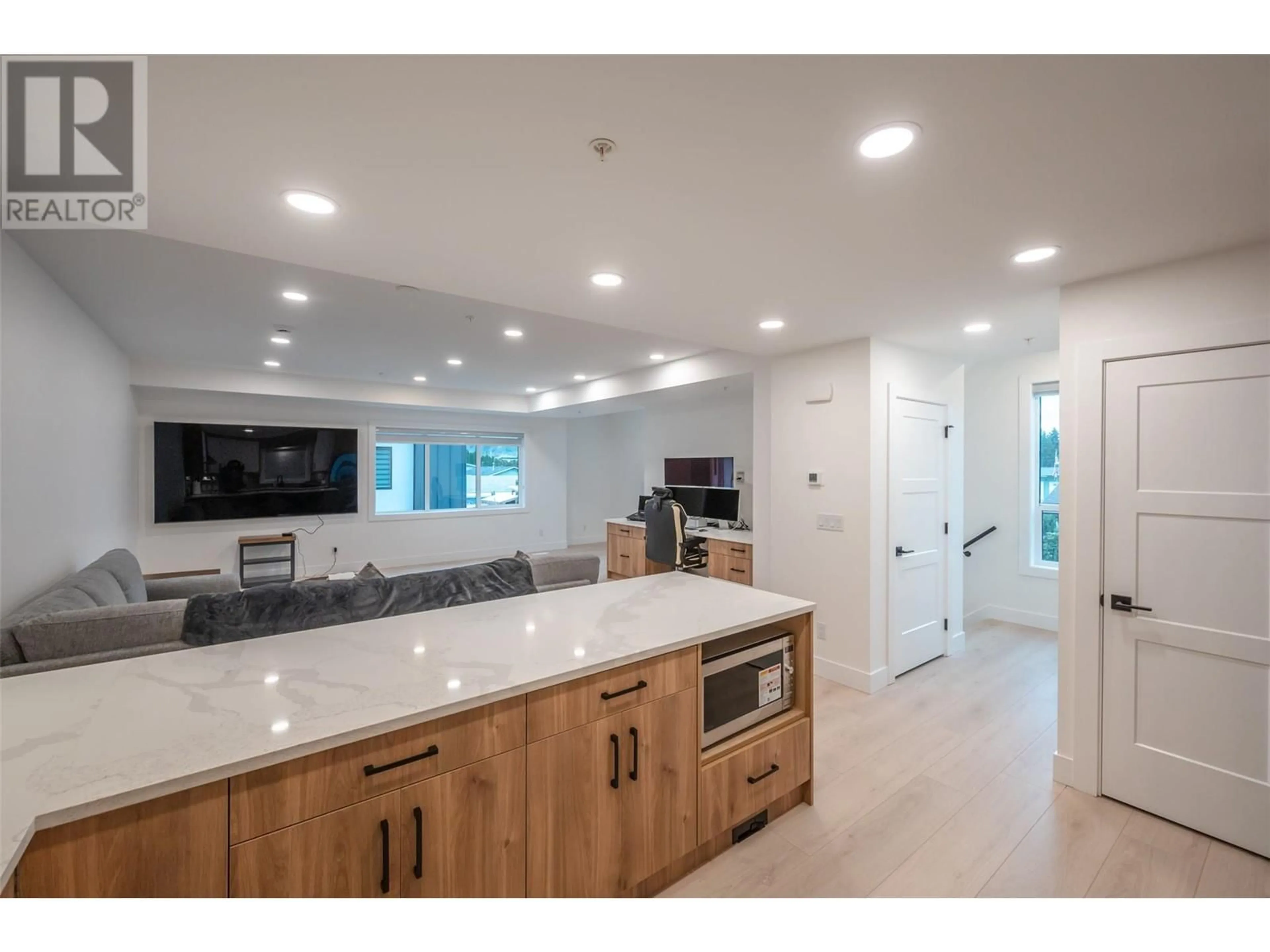 Open concept kitchen, ceramic/tile floor for 104 - 10615 ELLIOTT STREET, Summerland British Columbia V0H1Z2