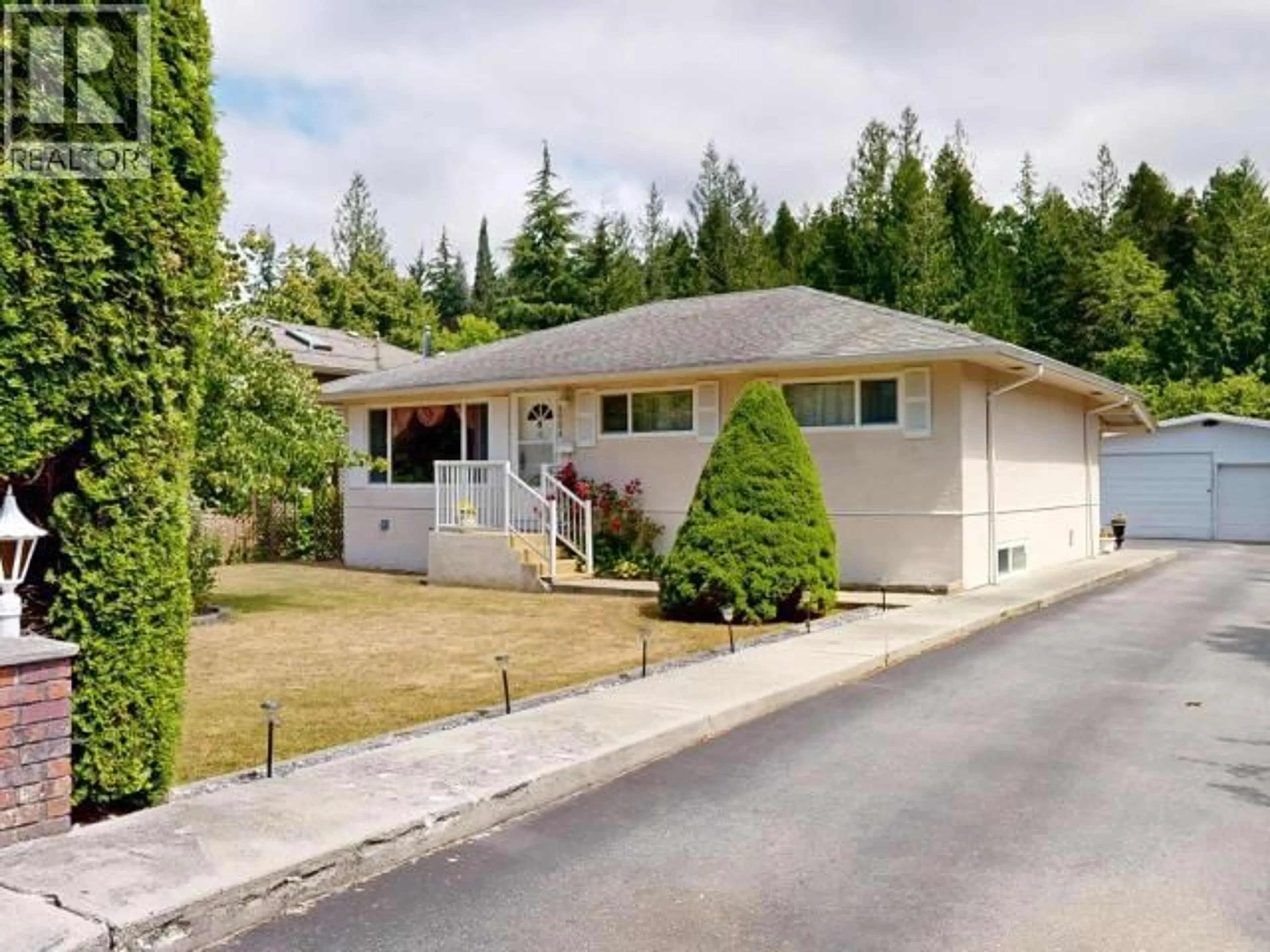 Home with vinyl exterior material, street for 4904 QUEENS AVE, Powell River British Columbia V8A3S7