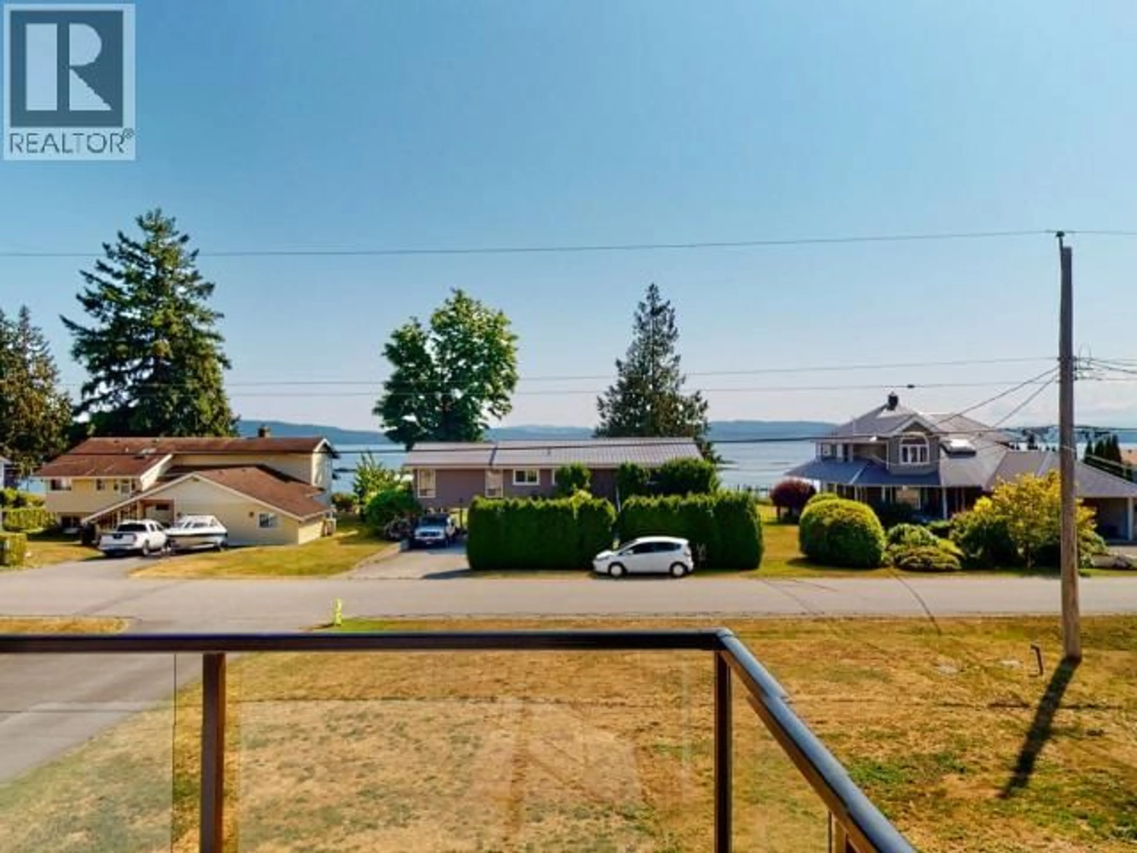 A pic from outside/outdoor area/front of a property/back of a property/a pic from drone, water/lake/river/ocean view for 8206 CENTENNIAL DRIVE, Powell River British Columbia