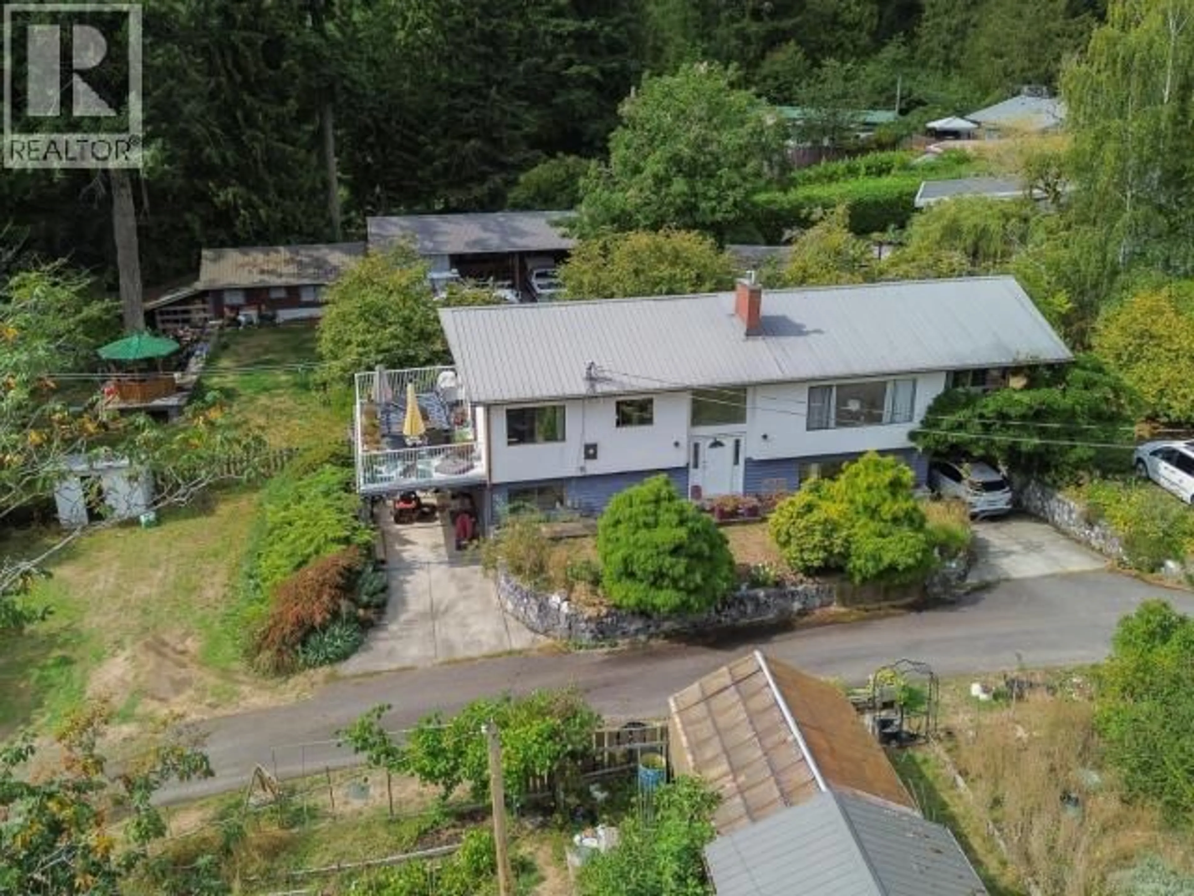A pic from outside/outdoor area/front of a property/back of a property/a pic from drone, unknown for 7889 HIGHWAY 101, Powell River British Columbia V8A0R7