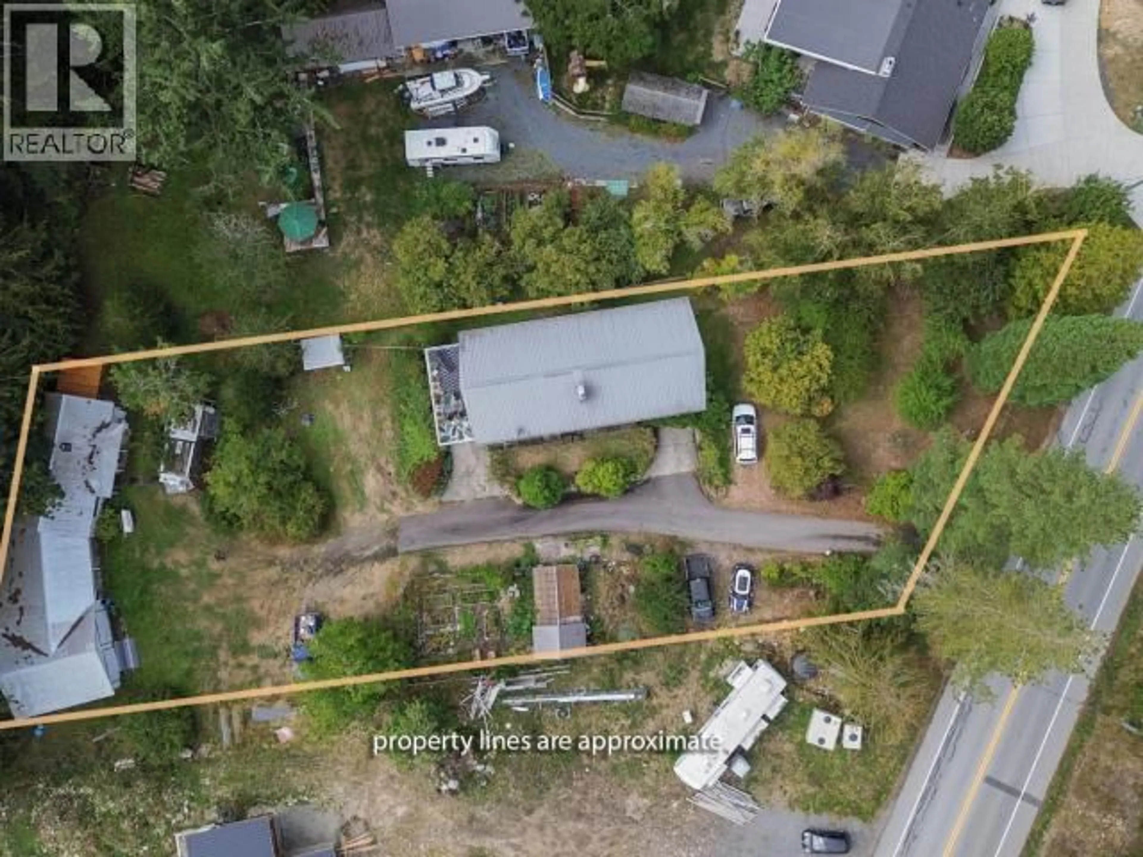 A pic from outside/outdoor area/front of a property/back of a property/a pic from drone, street for 7889 HIGHWAY 101, Powell River British Columbia V8A0R7