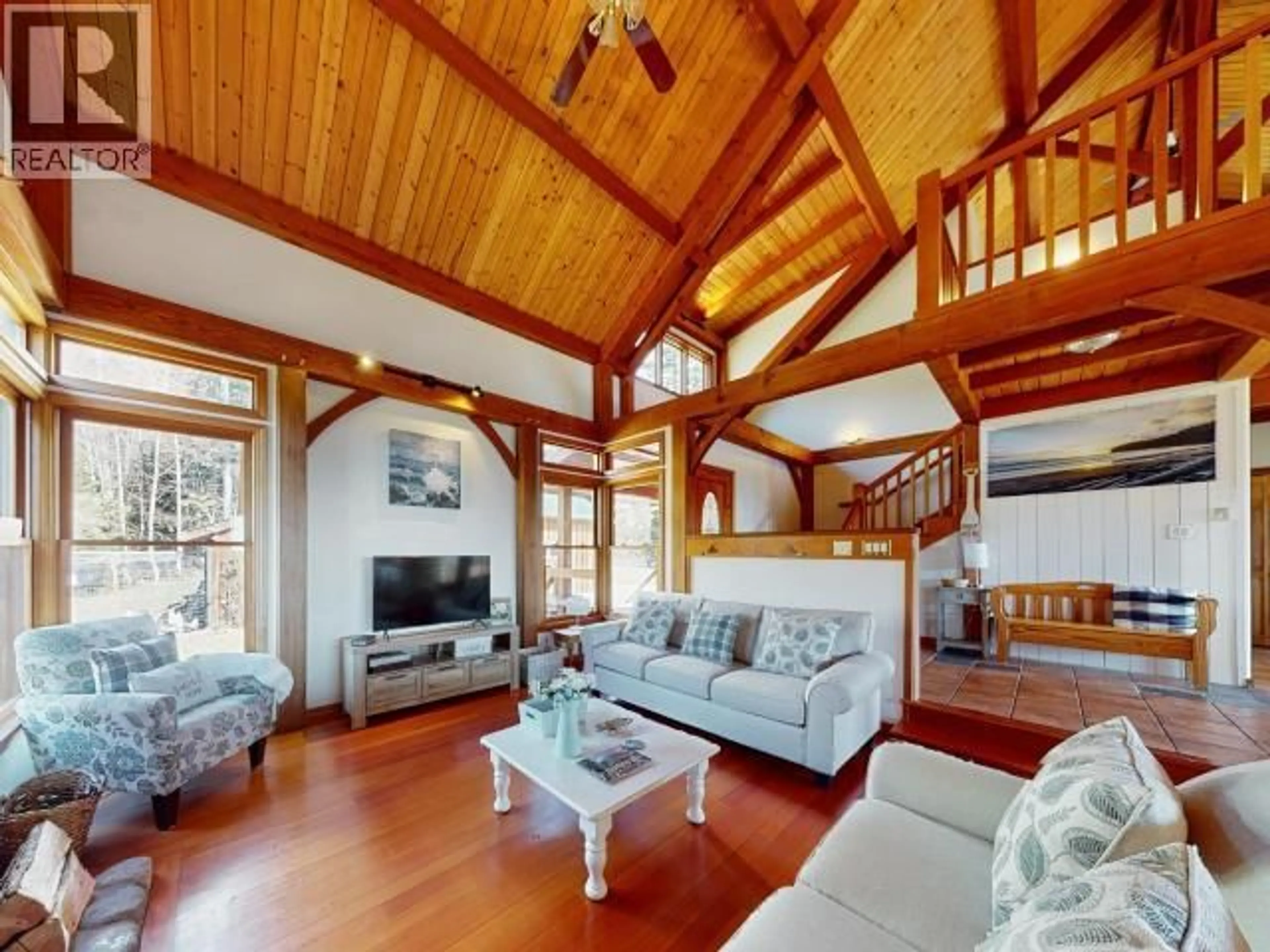 Living room with furniture, wood/laminate floor for 3749 HIGHWAY 101, Powell River British Columbia V8A0E2